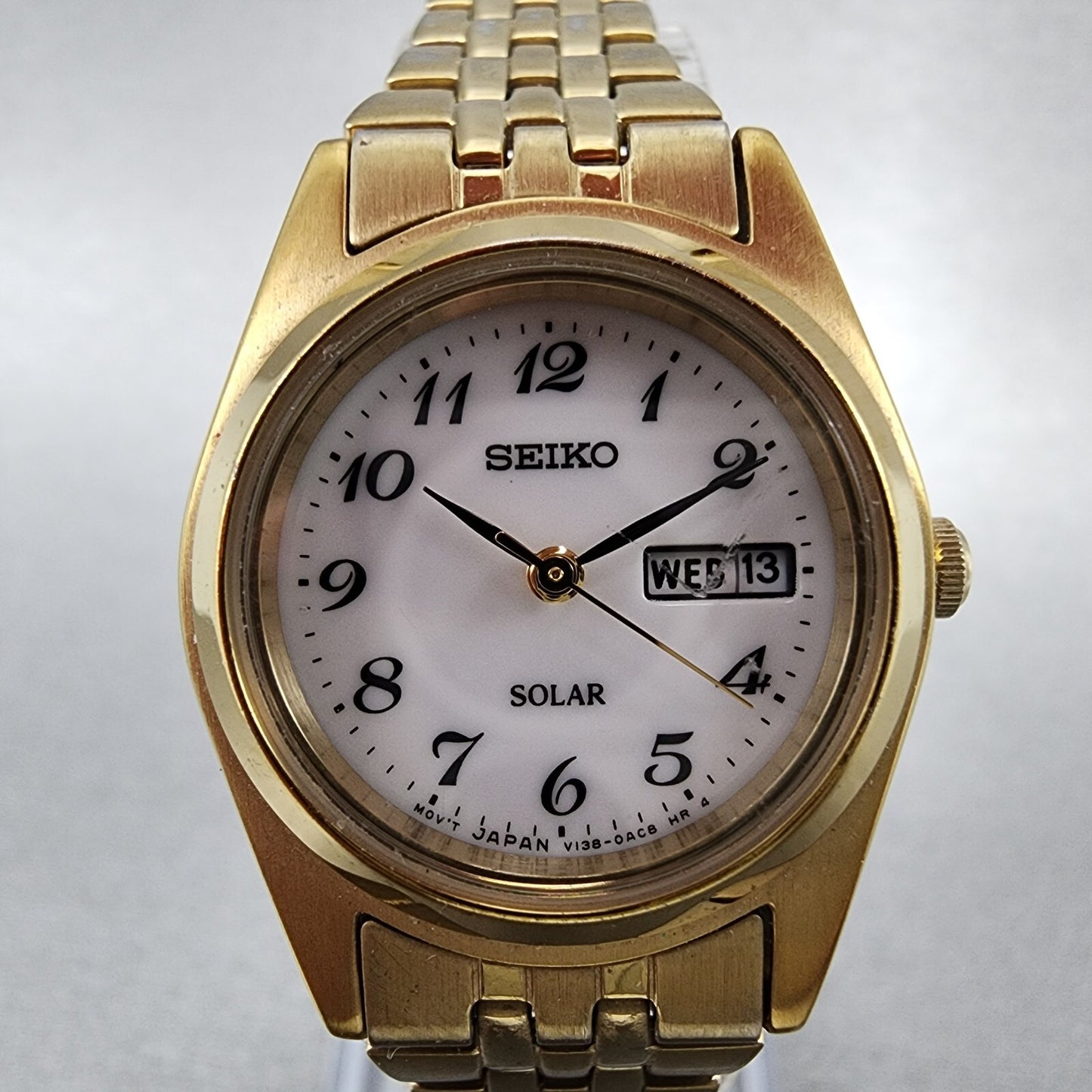 Seiko Solar Watch Women 26mm White Dial Gold Tone Daydate Round V138-0AA0 Runs