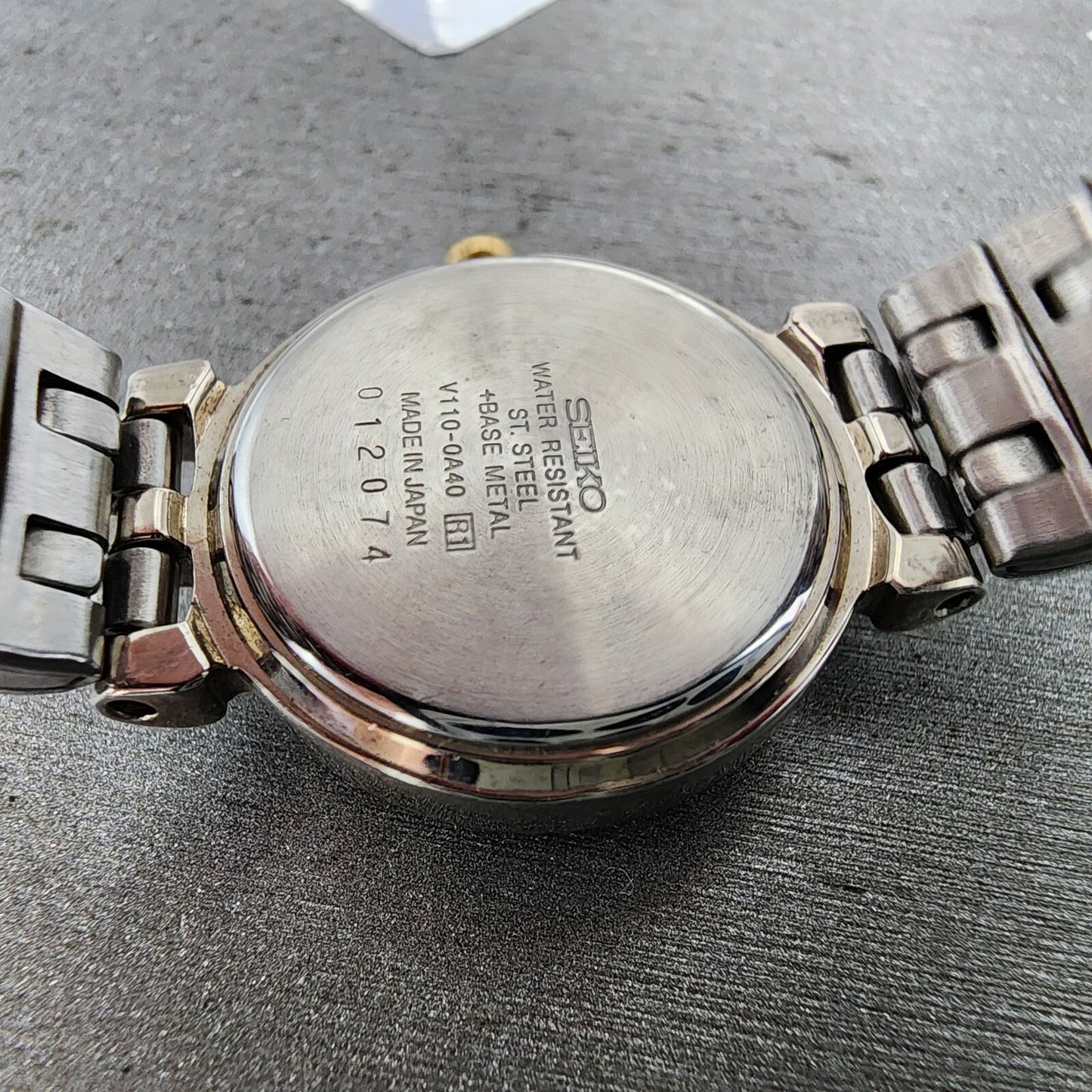 Seiko Solar Watch Women 23mm Champagne Dial Silver Tone V110-0a40 Runs