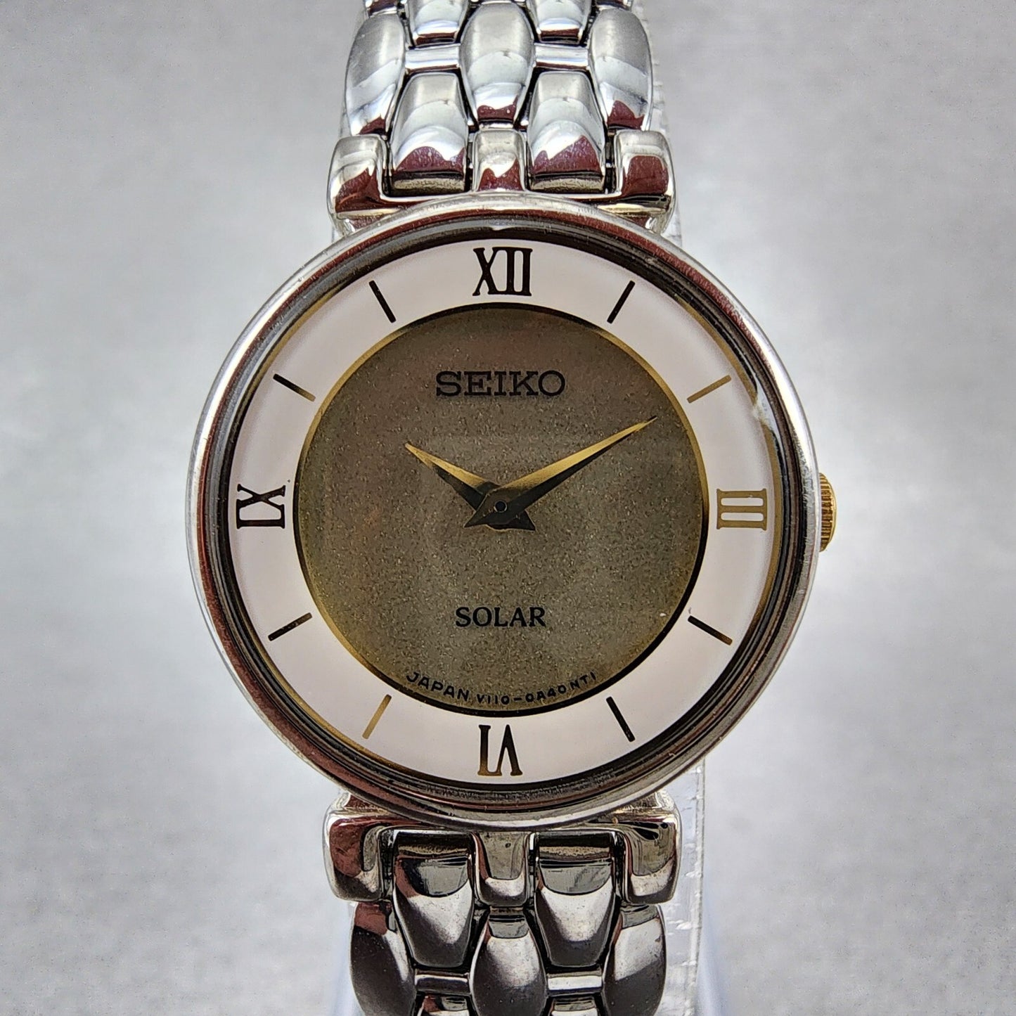 Seiko Solar Watch Women 23mm Champagne Dial Silver Tone V110-0a40 Runs