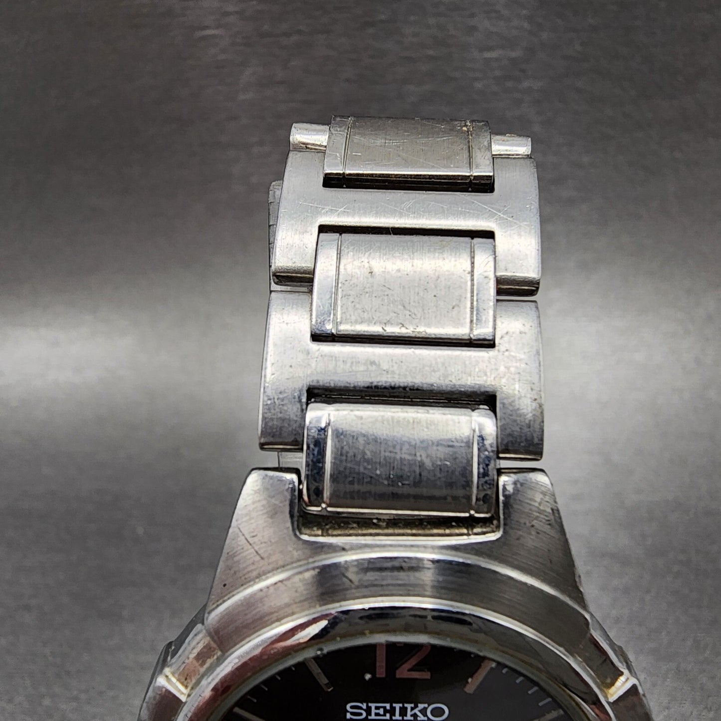 Seiko Watch Men 35mm Black Dial Silver Tone Round V701-2K80 New Battery VTG