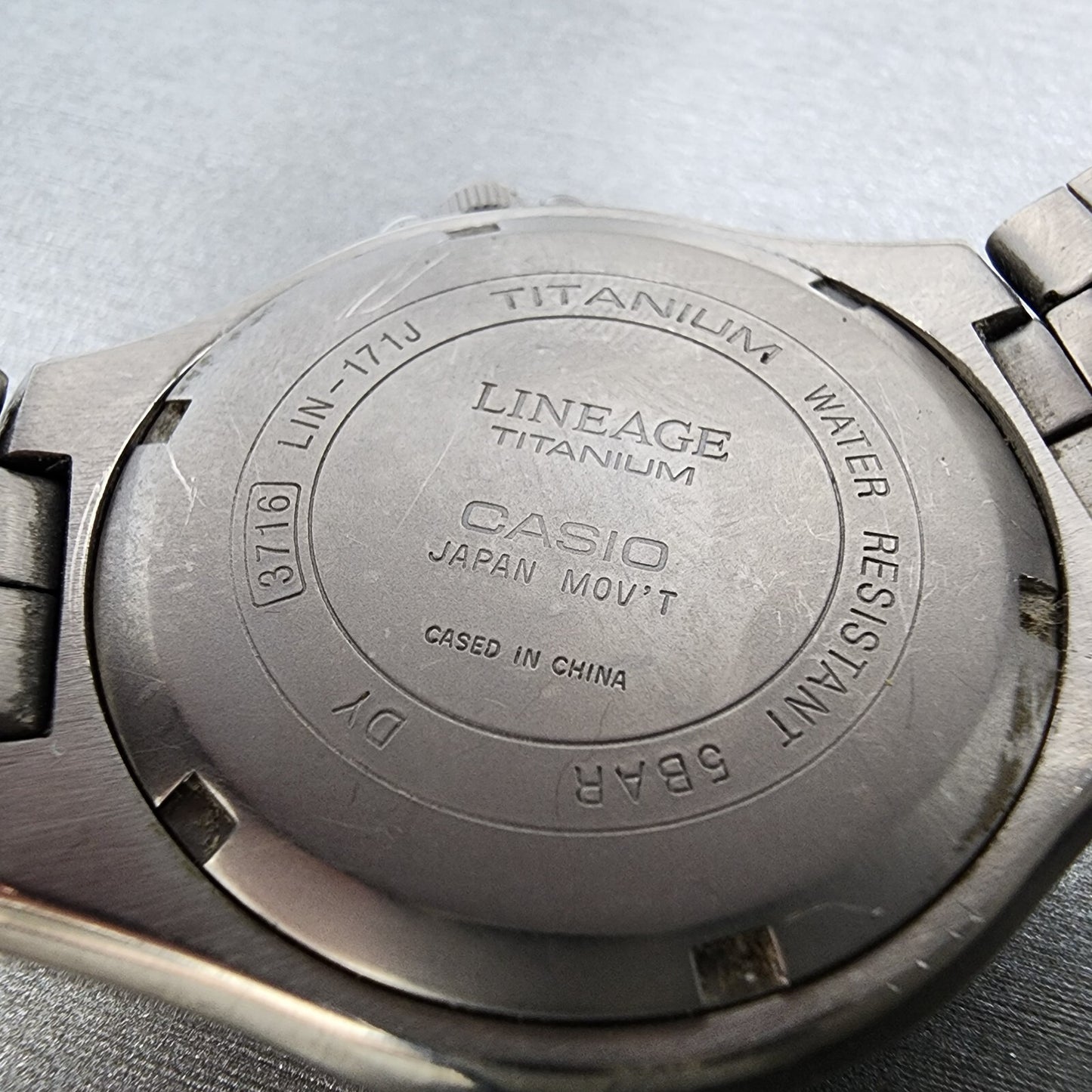 Casio Lineage Titanium Watch Men 38mm Silver Dial Daydate LIN-171J New Battery