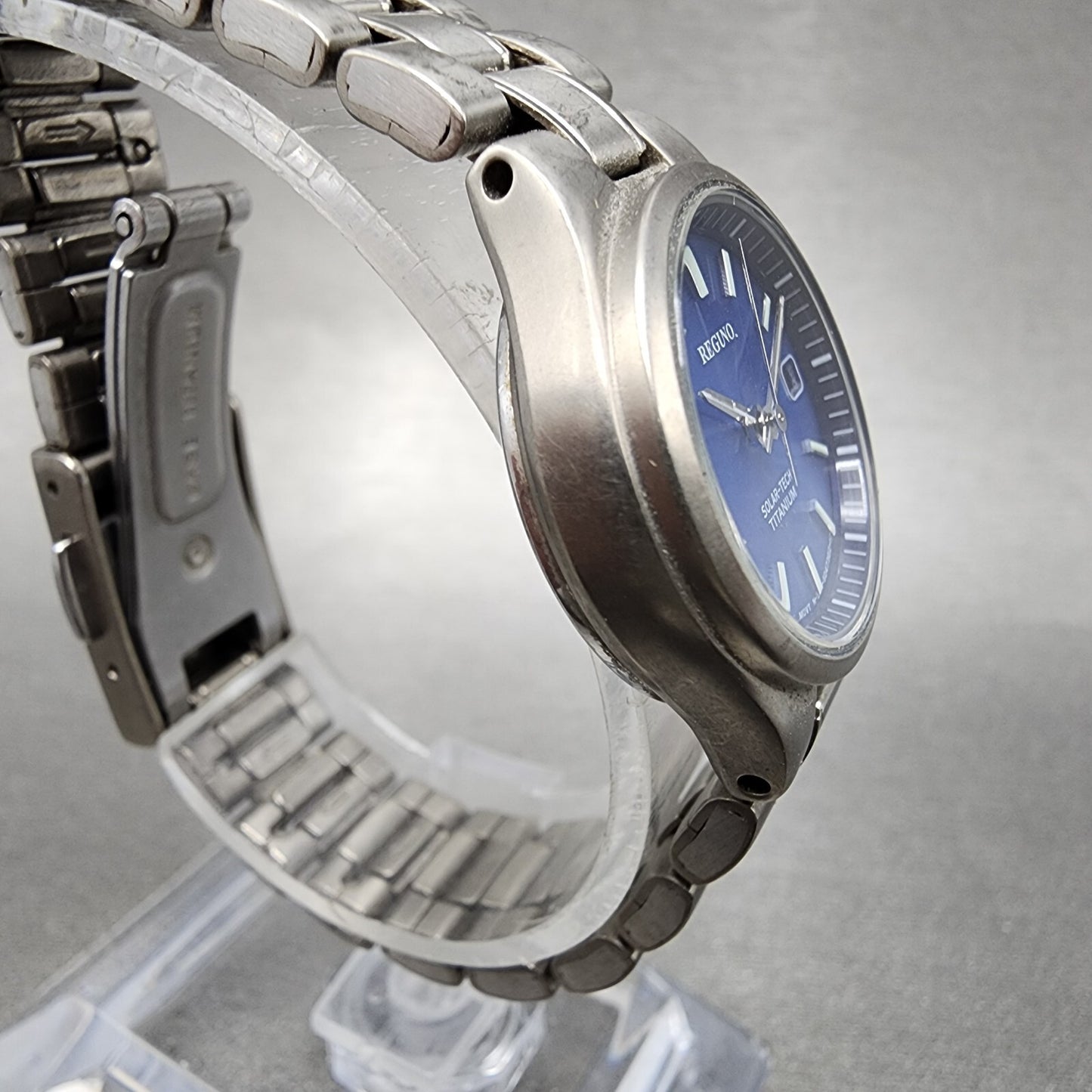 Reguno Solar Watch Women 25mm Blue Dial Titanium Date E011-S028132 Runs