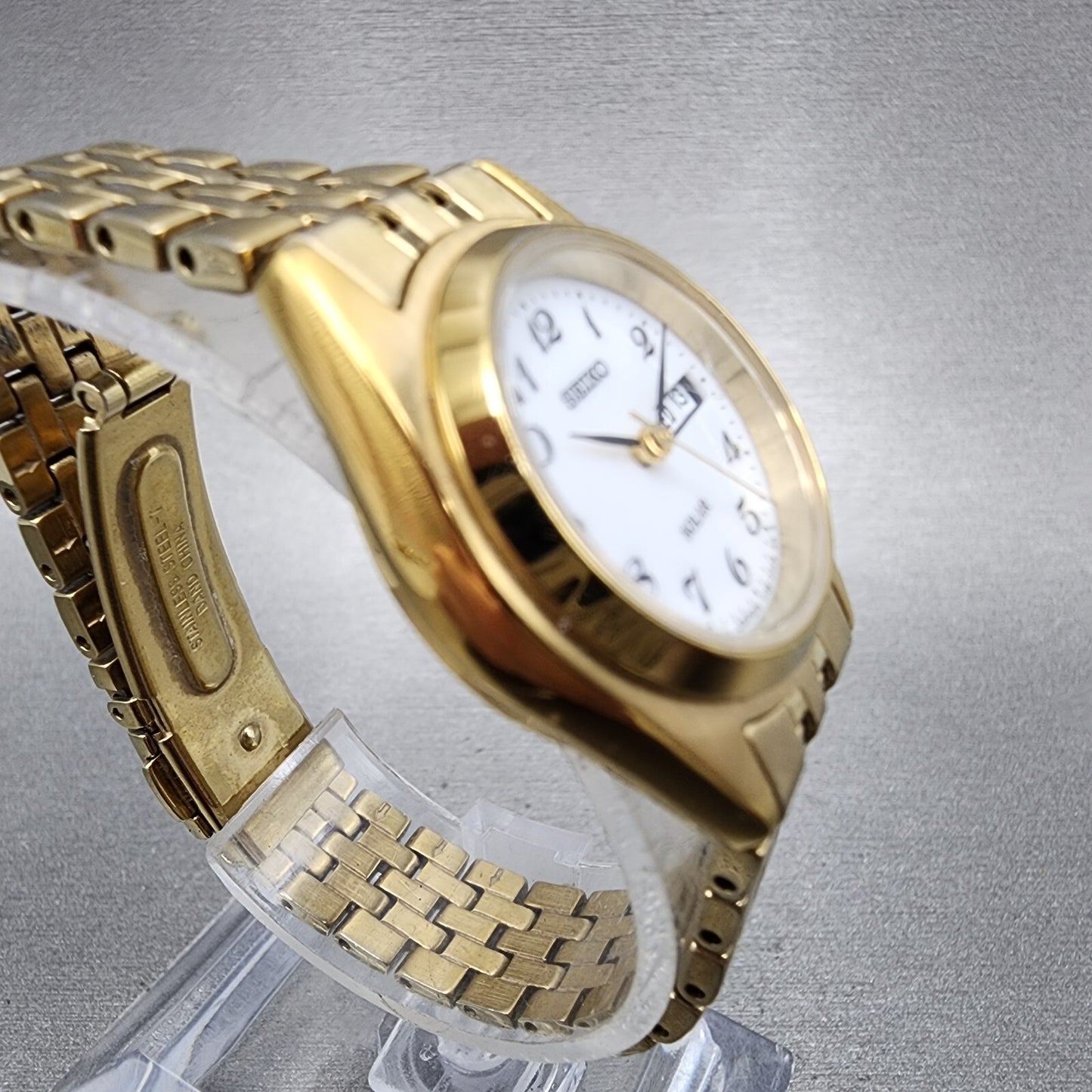 Seiko Solar Watch Women 26mm White Dial Gold Tone Daydate Round V138-0AA0 Runs