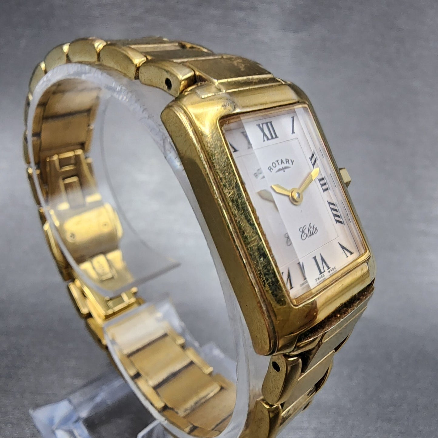 Rotary Elite Tank Watch Women 20mm White Dial Gold Tone Rectangle New Battery