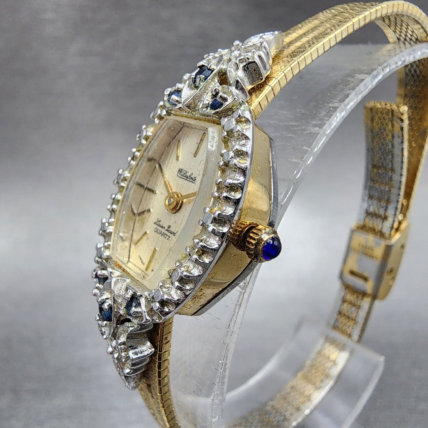 Lucien Piccard Dufonte Watch Women 16mm Champagne Dial Gold Tone Sapphire Bezel