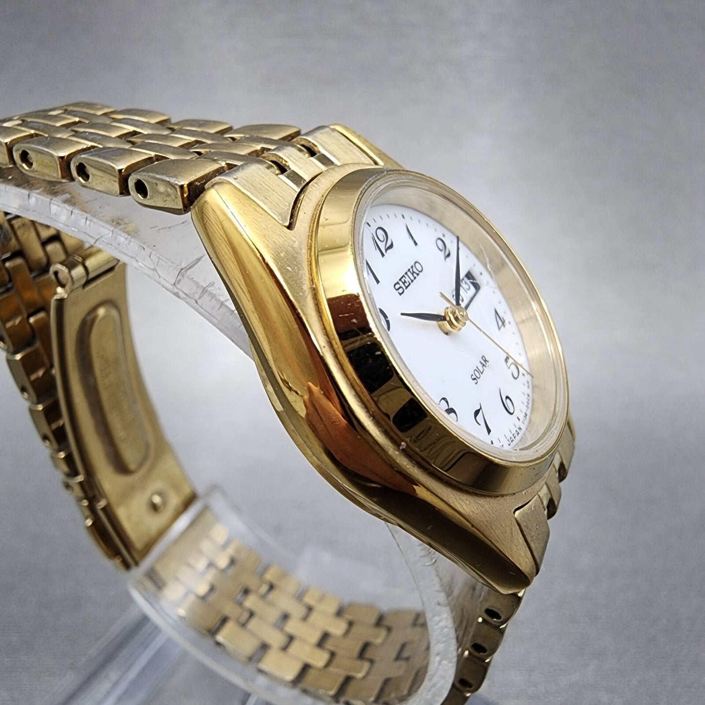 Seiko Solar Watch Women 26mm White Dial Gold Tone Daydate Round V138-0AA0 Runs