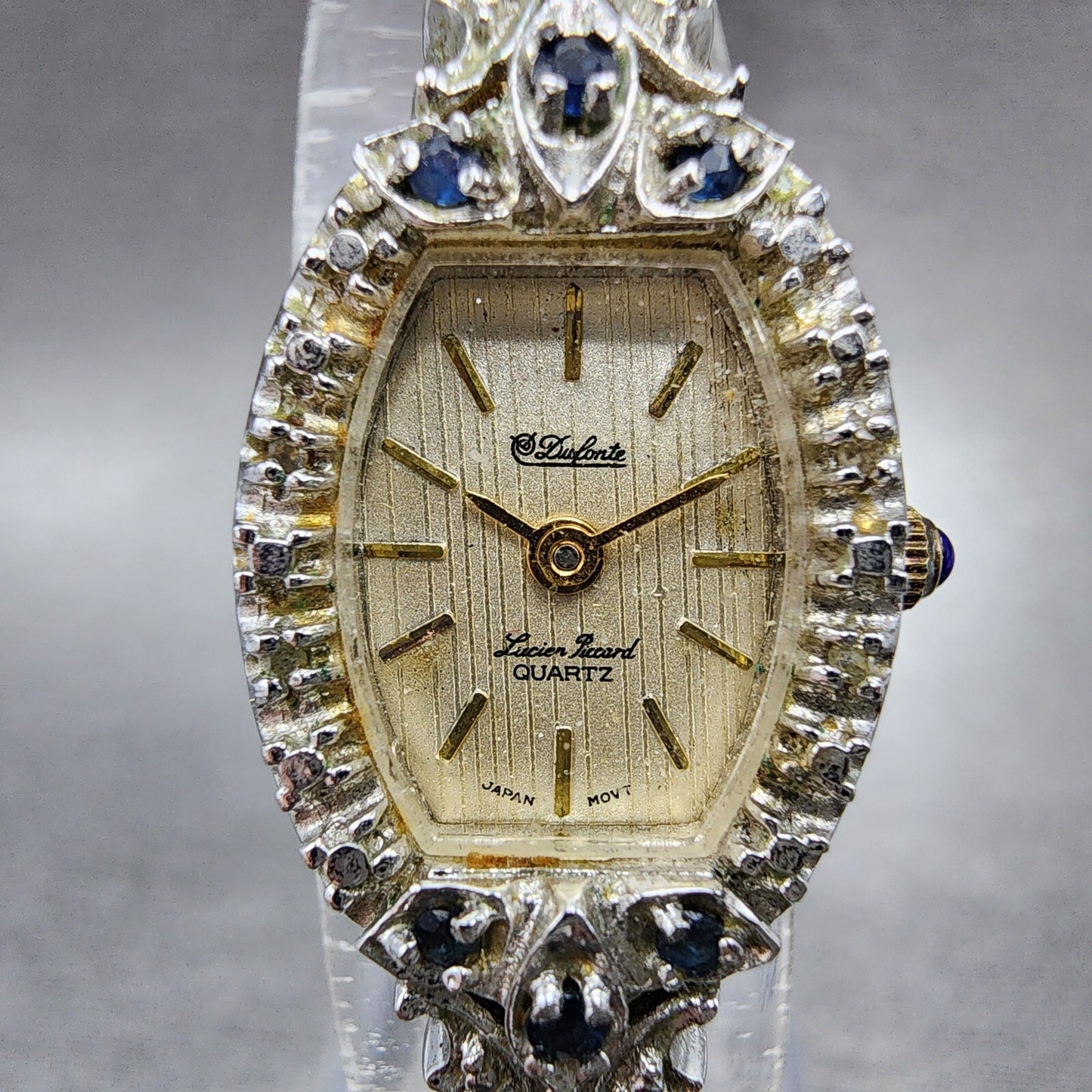 Lucien Piccard Dufonte Watch Women 16mm Champagne Dial Gold Tone Sapphire Bezel