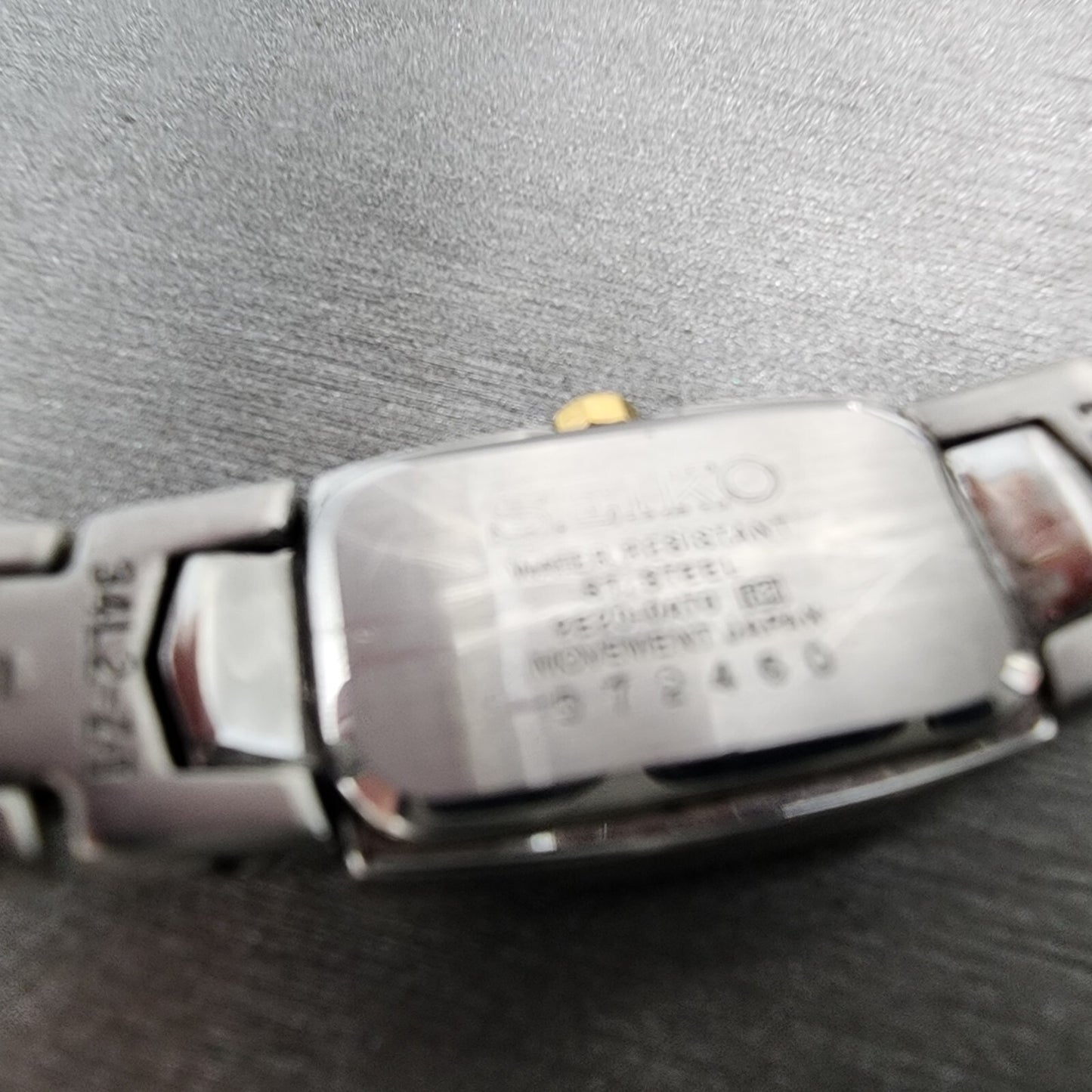 Seiko Watch Women 14mm White Dial Two Tone 2e20-0at0 New Battery