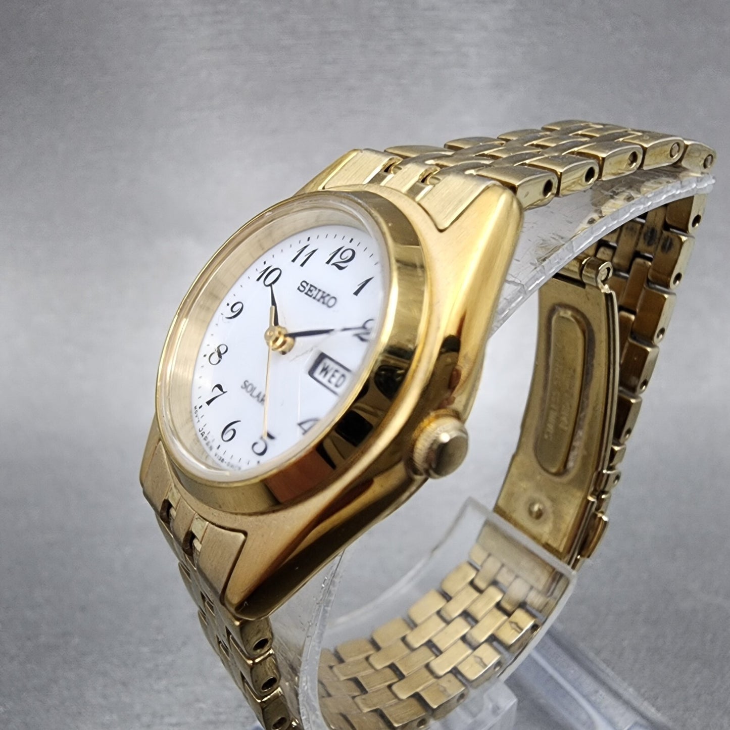Seiko Solar Watch Women 26mm White Dial Gold Tone Daydate Round V138-0AA0 Runs