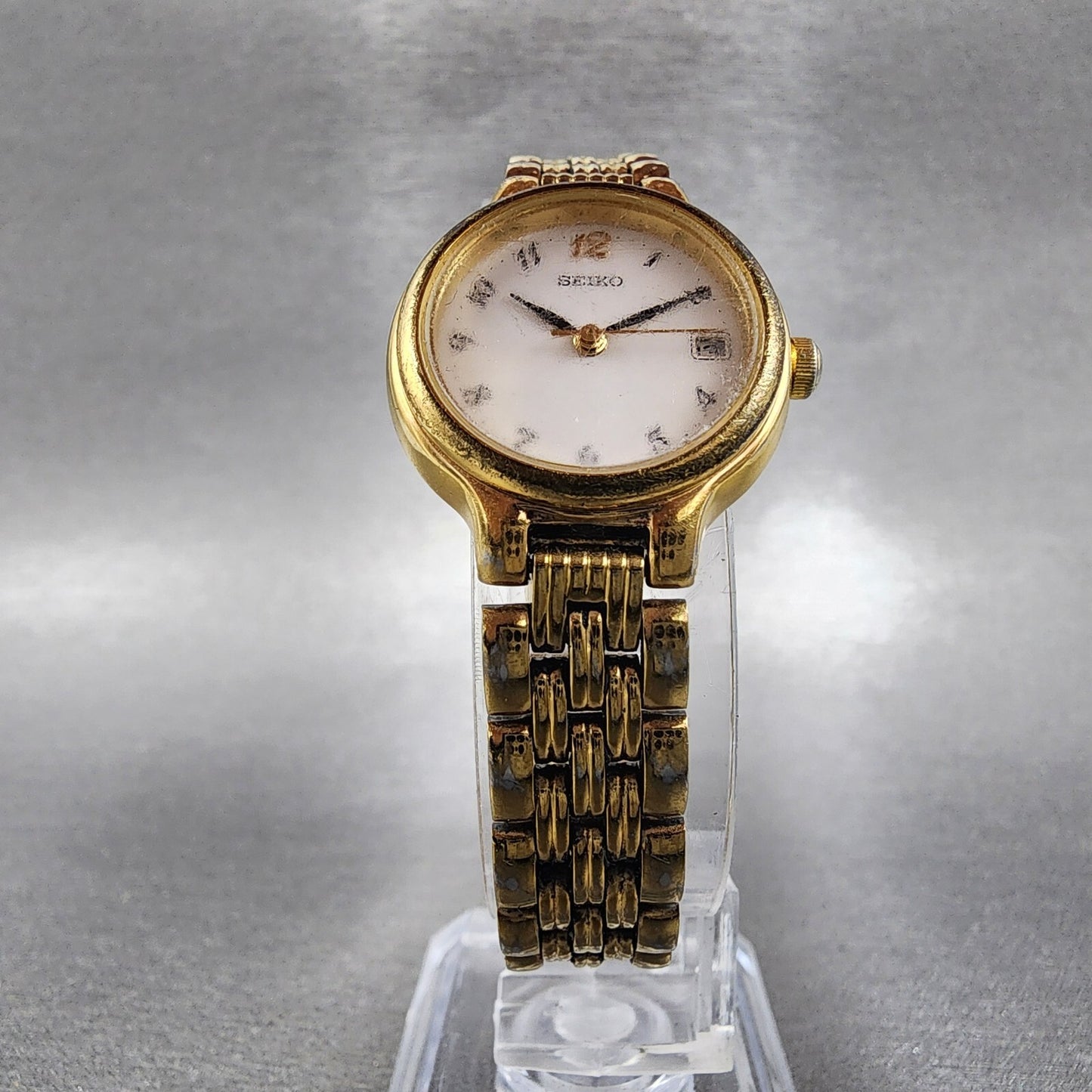 Seiko Watch Women 23mm White Dial Gold Tone Date Round 7N82-0228 New Battery