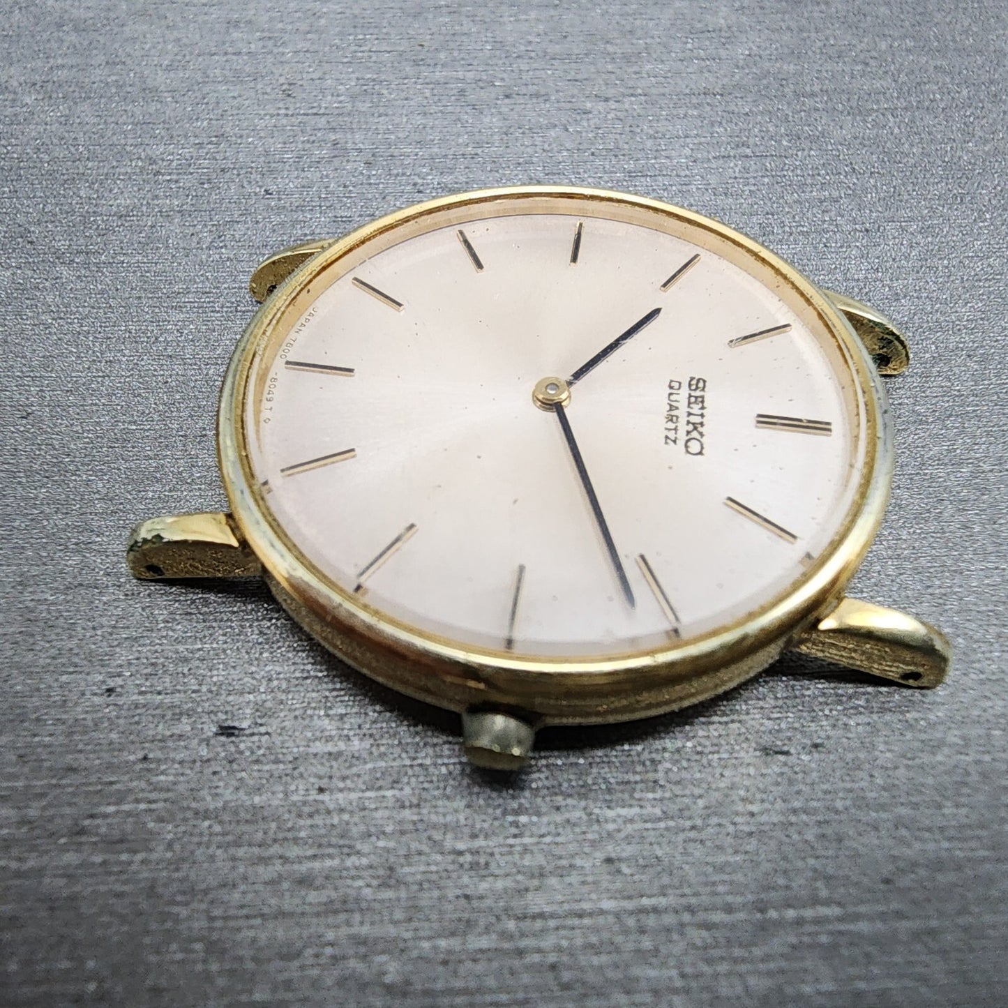 Seiko Watch Men 32mm Cream Dial Gold Tone Round 7800-8019 NO BAND New Battery