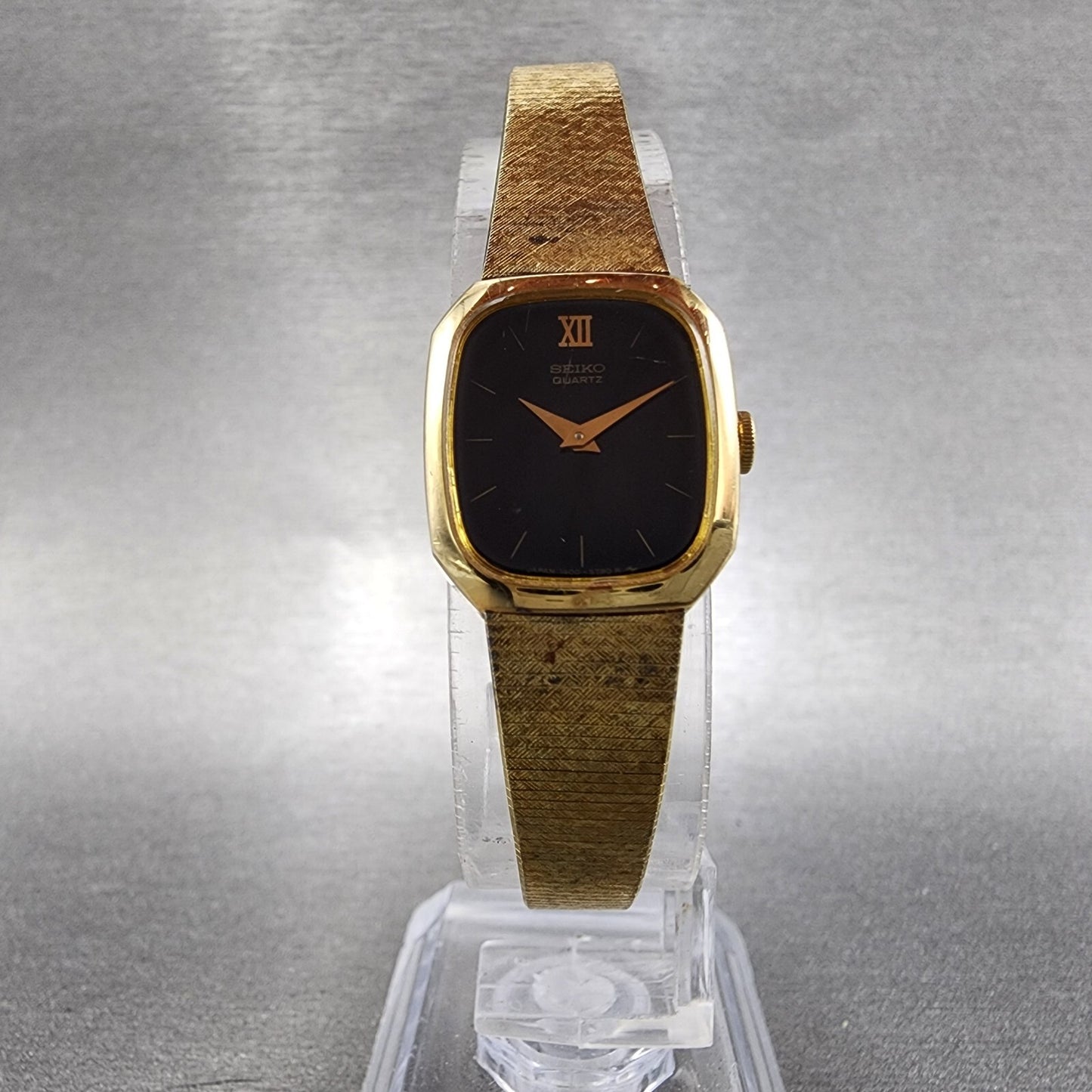 Seiko Watch Women 17mm Black Dial Gold Tone Rectangle 1400-8149 New Battery VTG