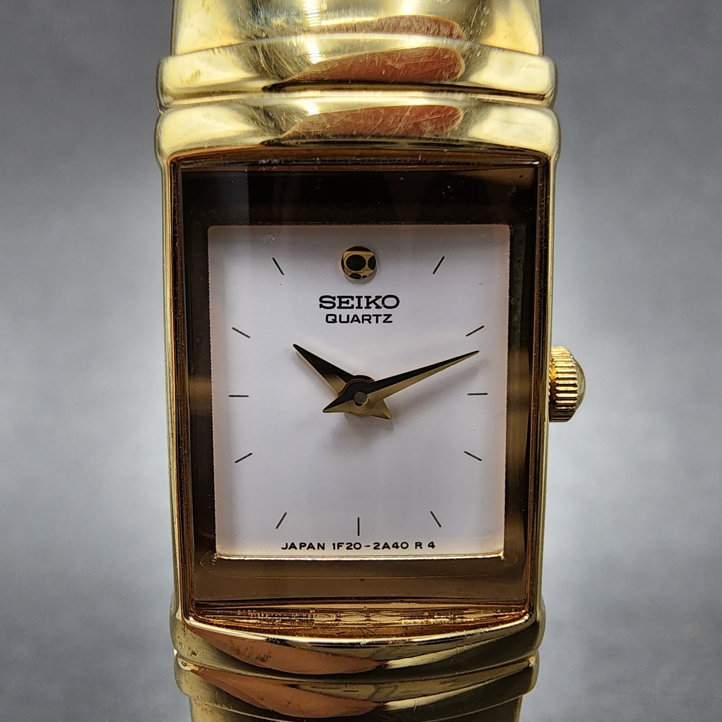 Seiko Watch Women 15mm White Dial Gold Tone Rectangle 1F20-5K19 New Battery