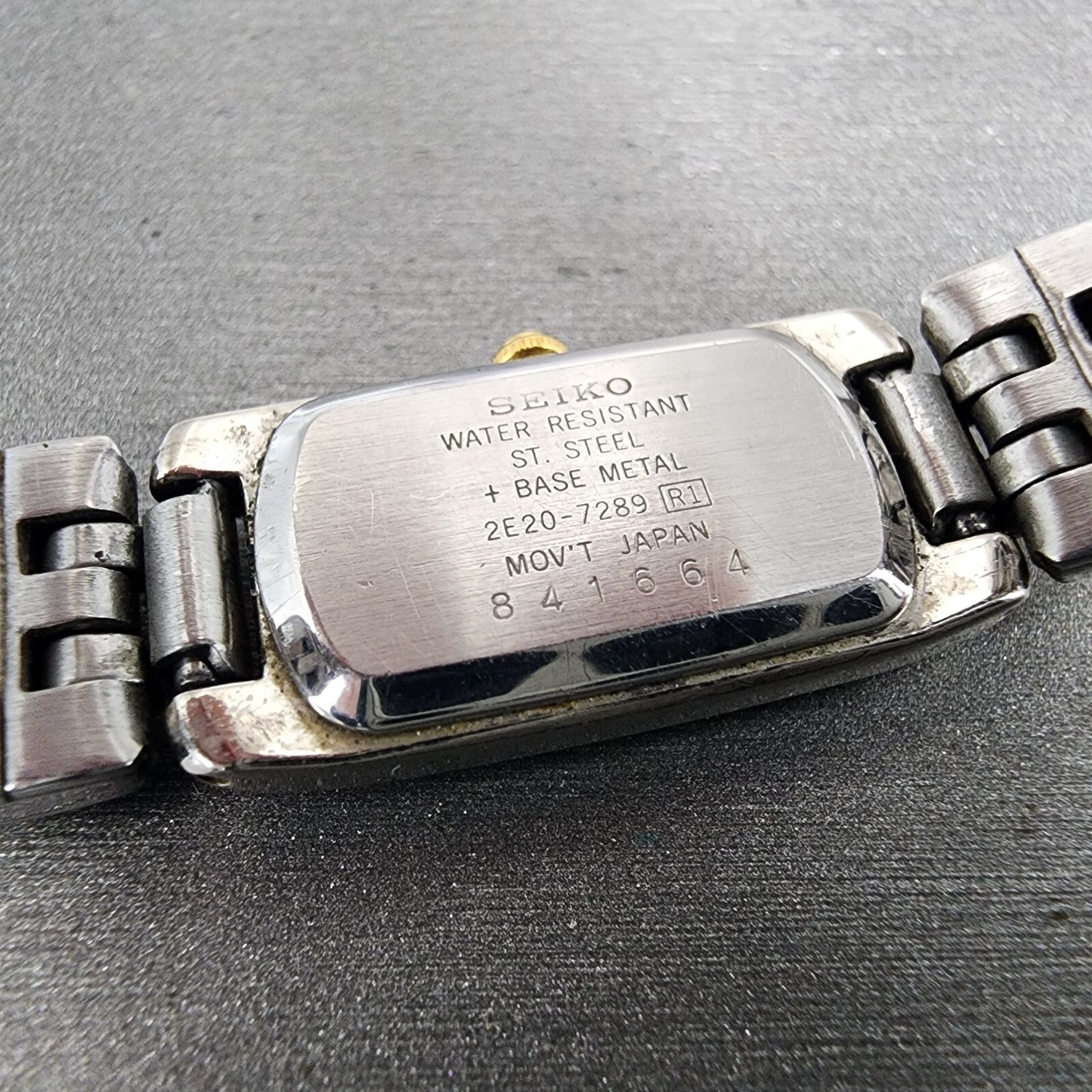 Seiko Watch Women 14mm Black Dial Two Tone Rectangle 2E20-7289 New Battery