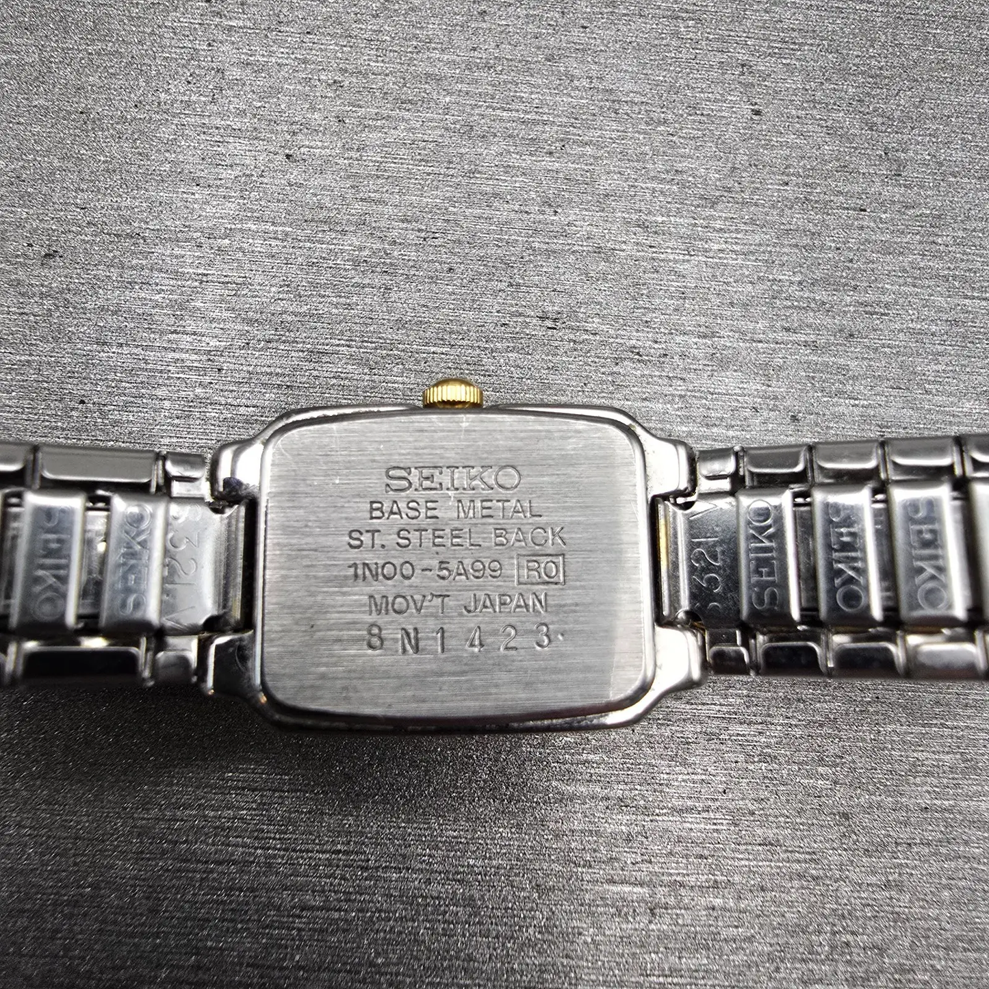 Seiko Watch Women 15mm Silver Dial Silver Tone Rectangle 1N00-5A99 New Battery10