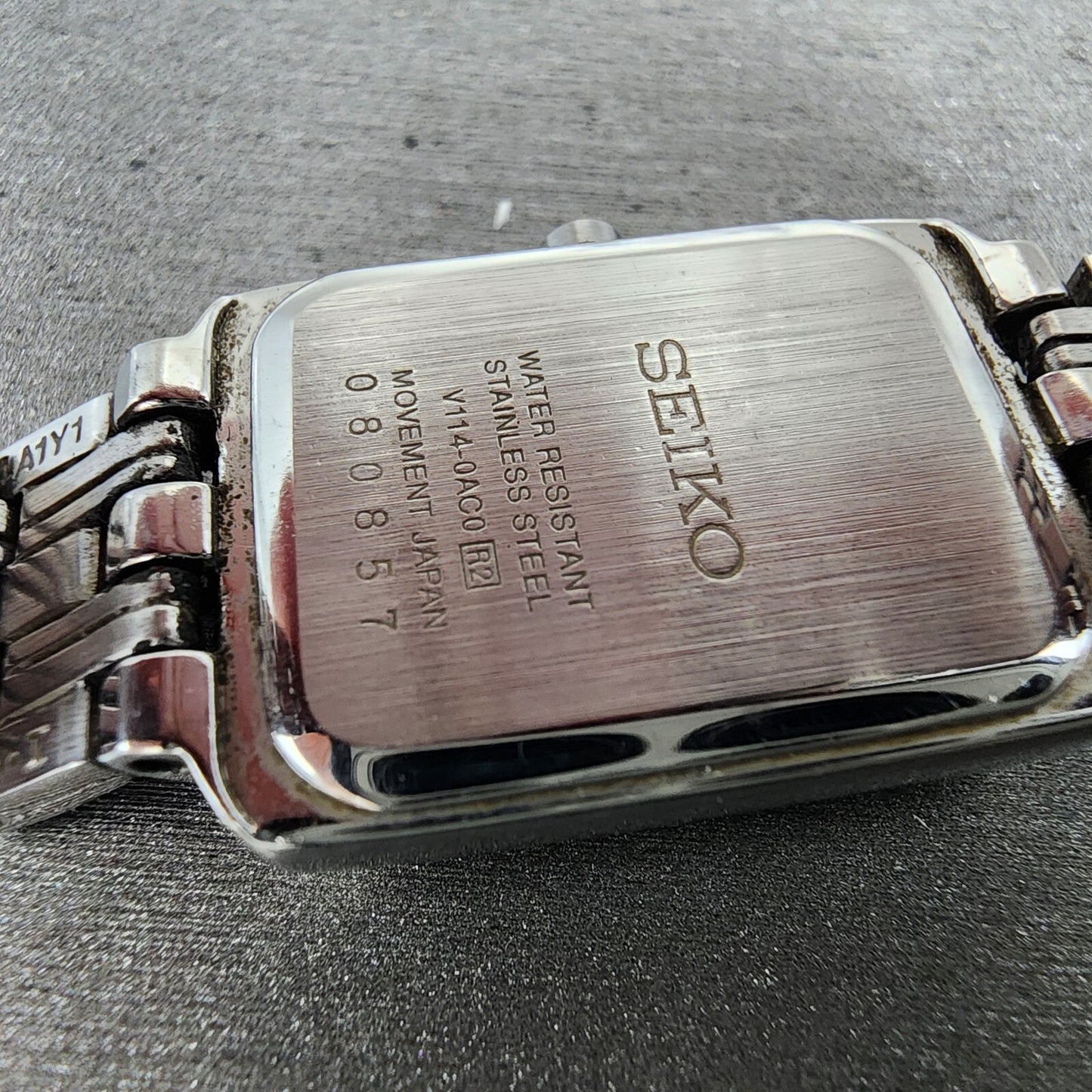 Seiko Solar Tank Watch Women 18mm White Dial Steel Rectangle V114-0AC0 Runs