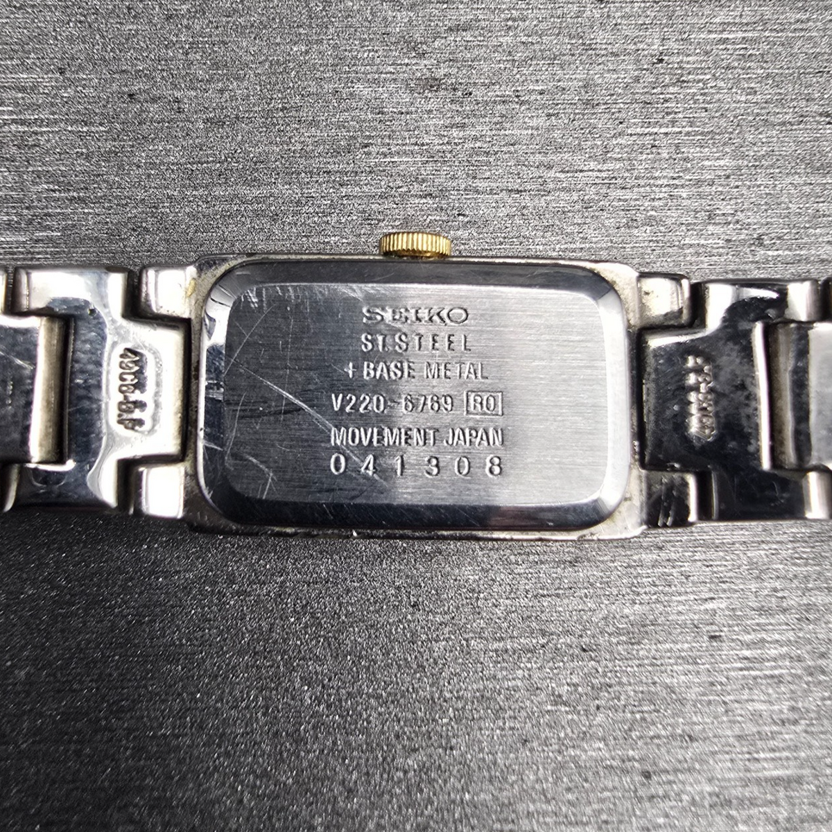 Seiko Watch Women 13mm White Dial Two Tone Rectangle V220-6769 New Battery10