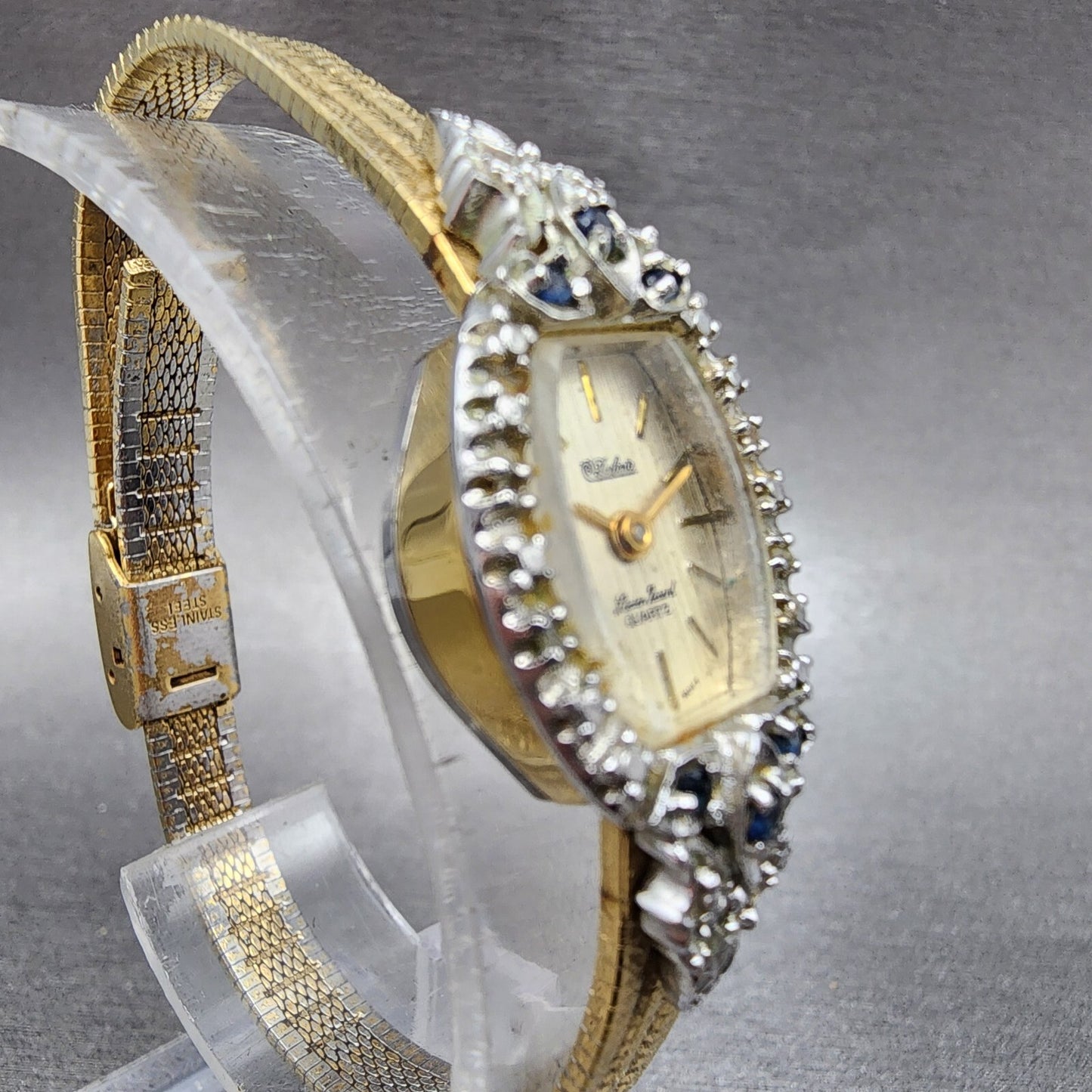 Lucien Piccard Dufonte Watch Women 16mm Champagne Dial Gold Tone Sapphire Bezel