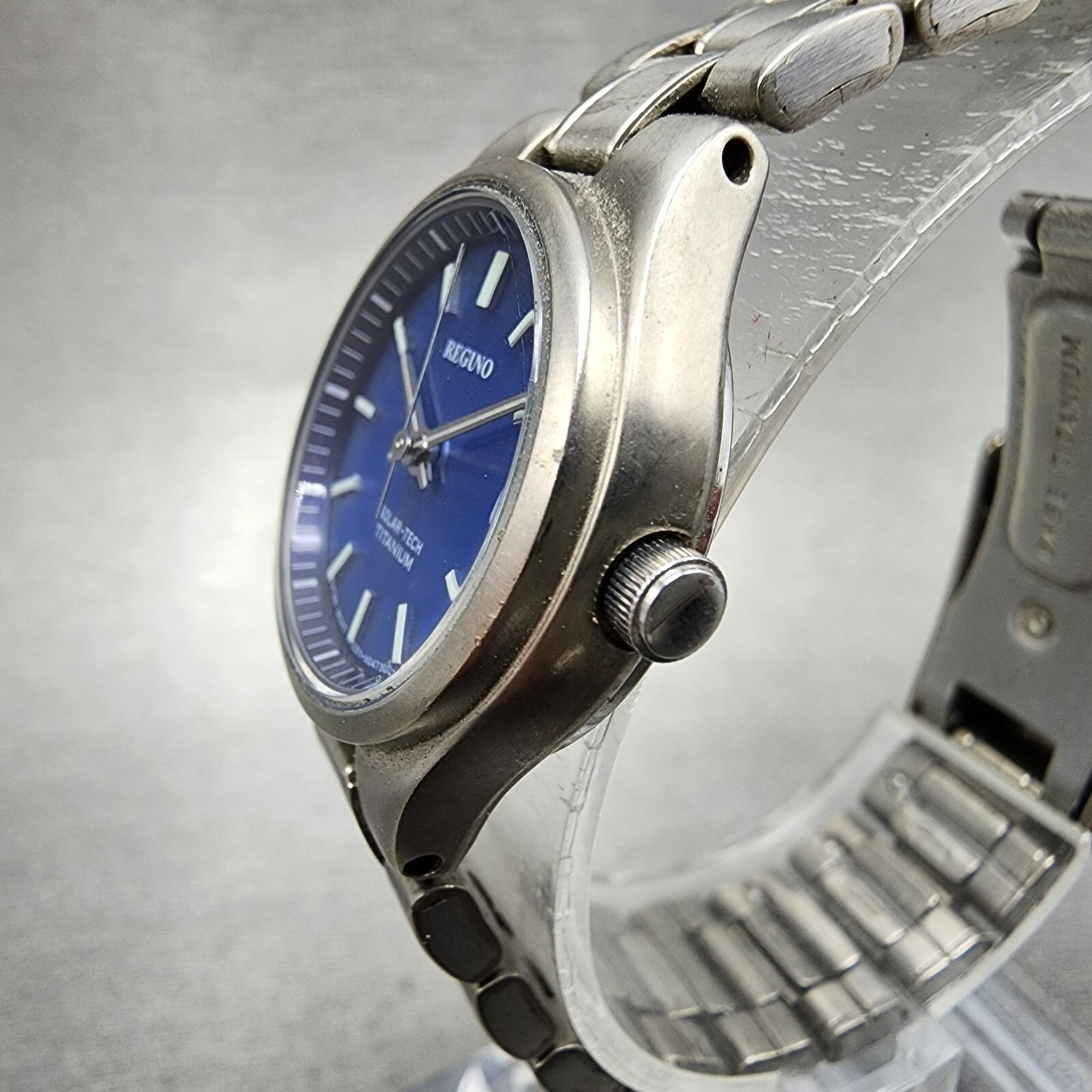 Reguno Solar Watch Women 25mm Blue Dial Titanium Date E011-S028132 Runs