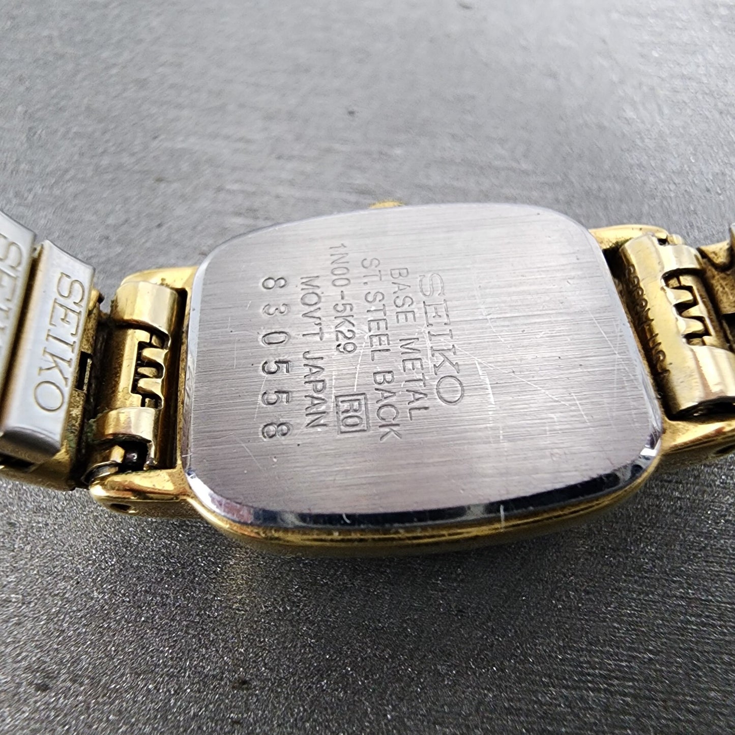 VTG Seiko Watch Women 17mm Black Dial Gold Tone Rectangle 1N00-5K29 New Battery
