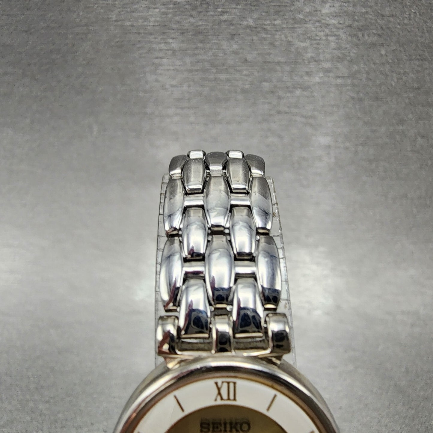 Seiko Solar Watch Women 23mm Champagne Dial Silver Tone V110-0a40 Runs
