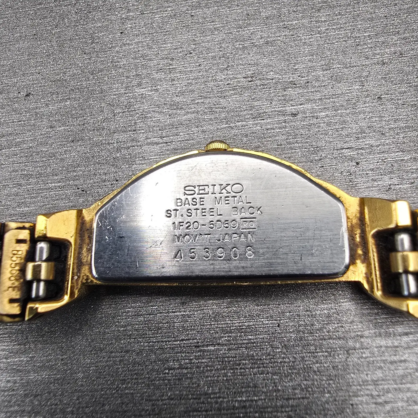 Seiko Watch Women 15mm Gold Dial Gold Tone Asymmetrical 1F20-5059 New Battery10