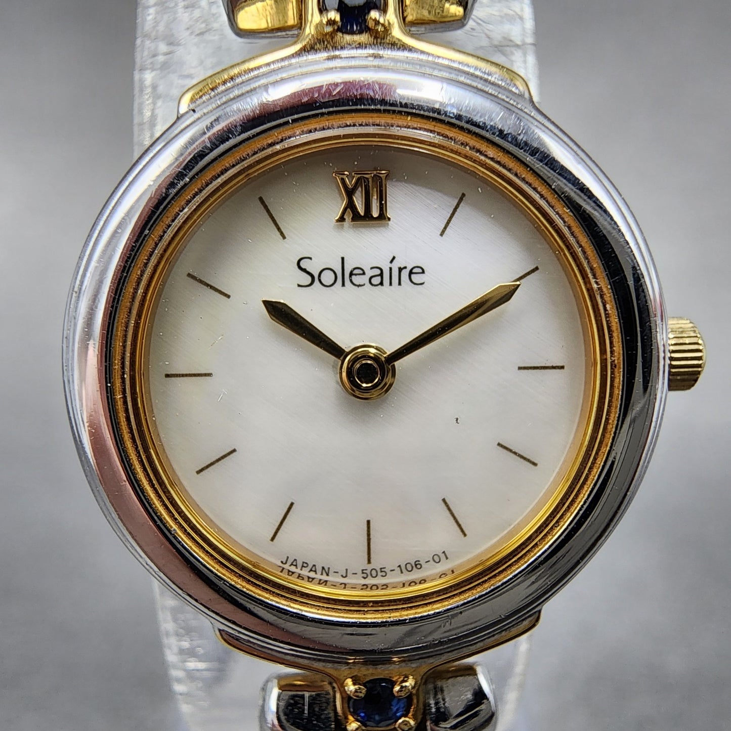 Ricoh Soleaire Watch Women 20mm MOP Dial Two Tone Blue Gemstones Round New Batt