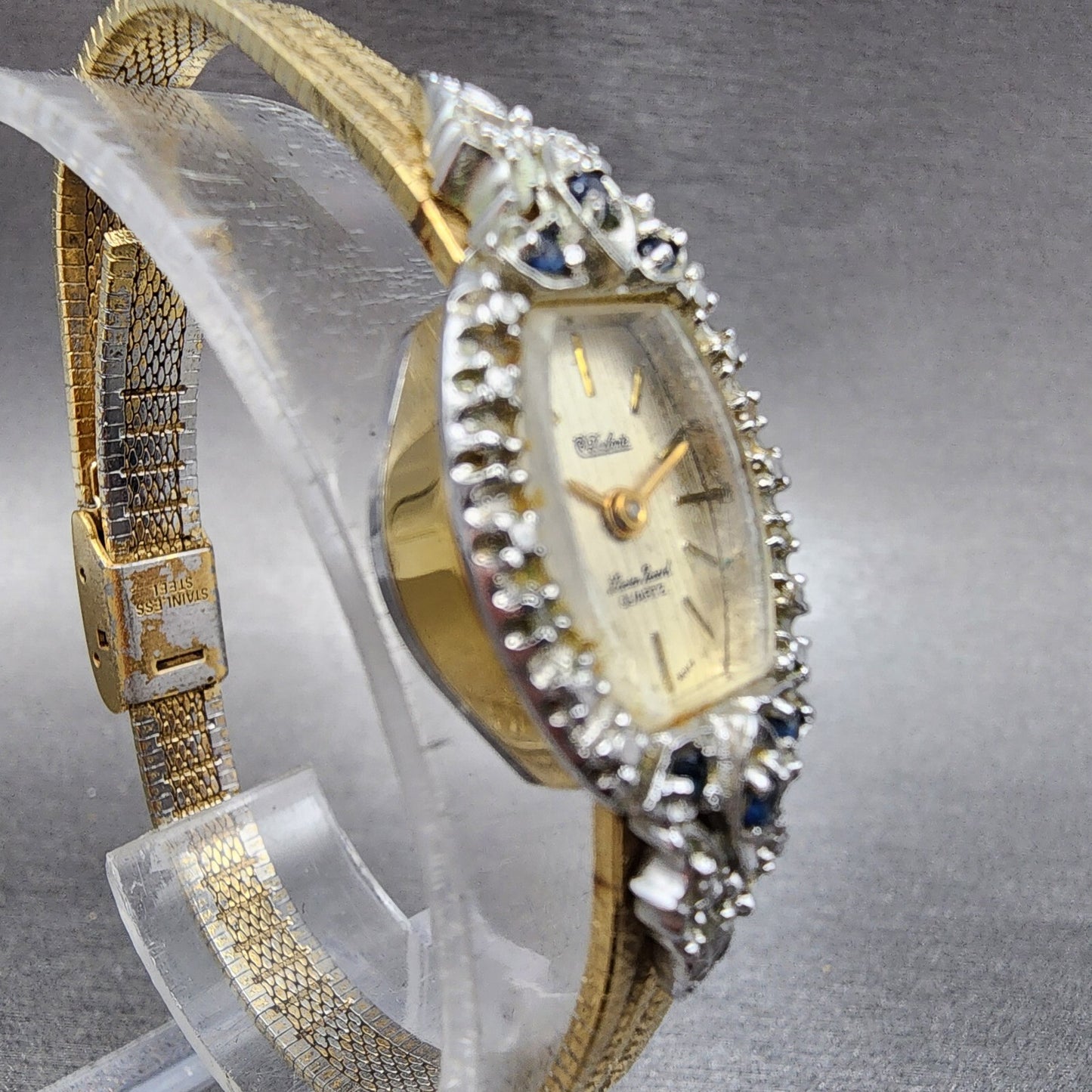 Lucien Piccard Dufonte Watch Women 16mm Champagne Dial Gold Tone Sapphire Bezel