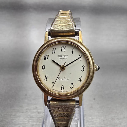 Seiko Exceline Watch Women 22mm Ivory Dial Gold Tone Round 7321-0070 New Battery0