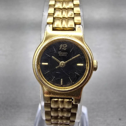Seiko Watch Women 19mm Black Dial Gold Tone Round V401-0988 New Battery Vintage0