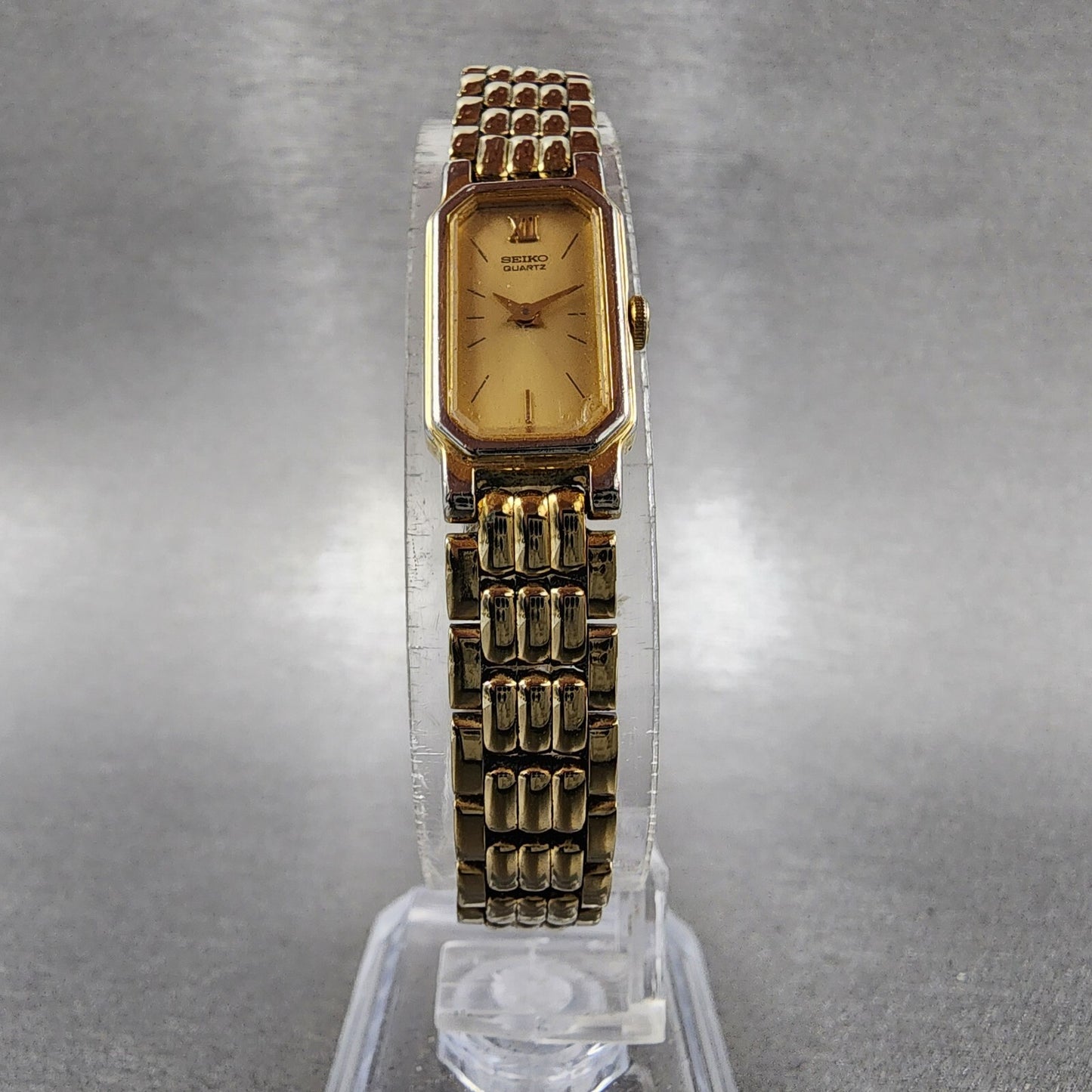 Seiko tank Watch Women 12mm Champagne Dial Gold Tone 2e206389 New Battery5