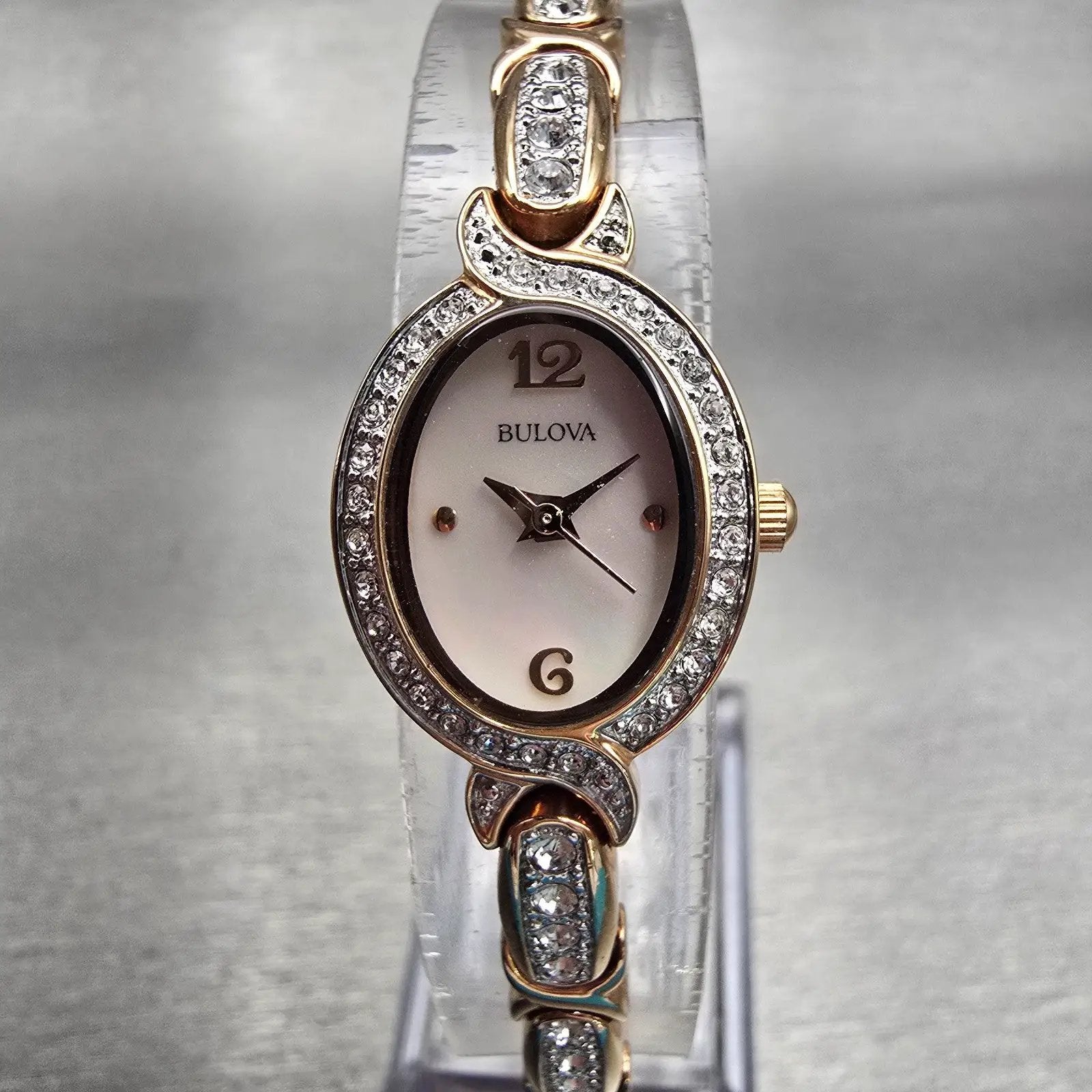 Bulova Watch Women 17mm MOP Dial Gold Tone Gemmed Oval 98L200 New Battery AD0