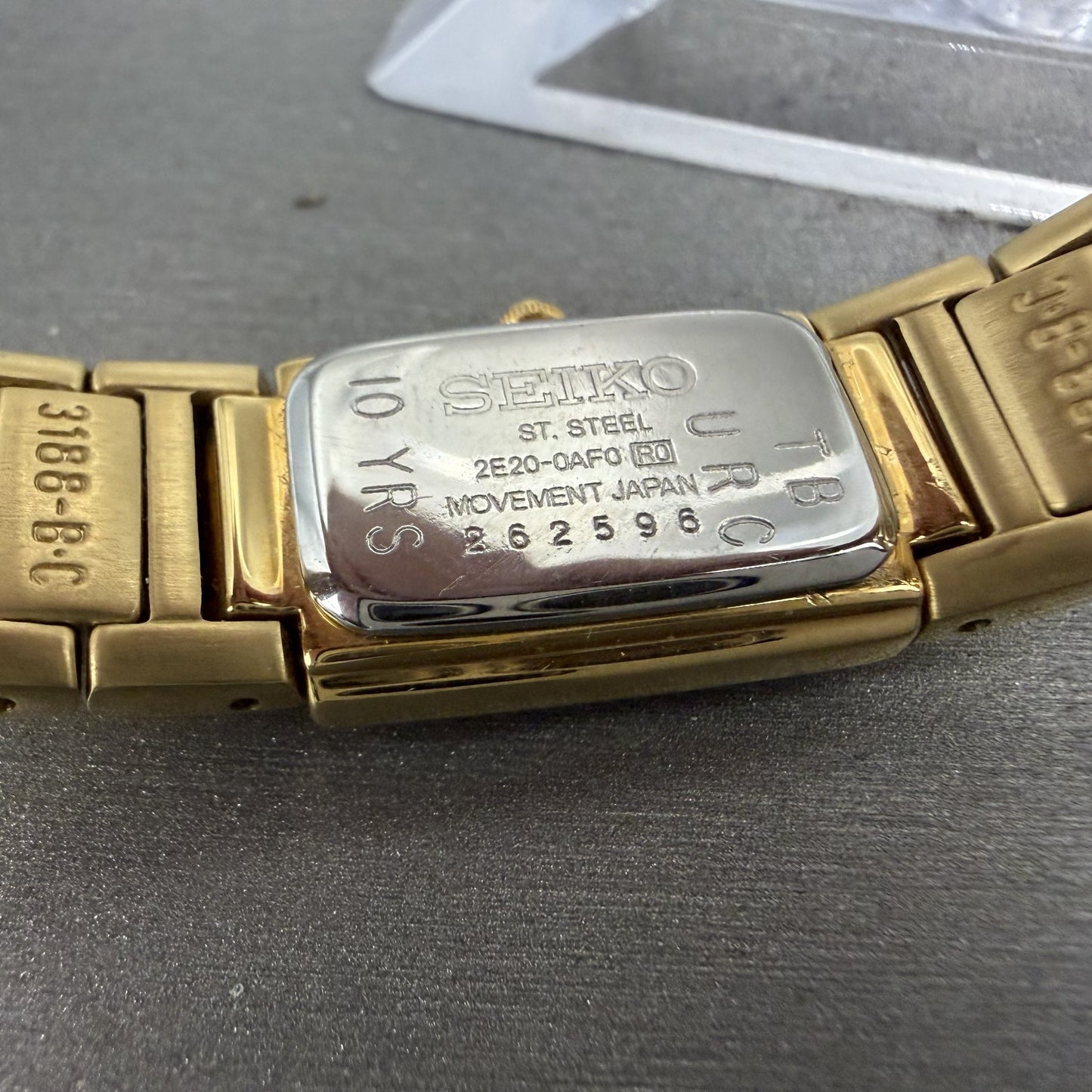 Seiko Tank Watch Women 15mm Champagne Dial Gold Tone 2E200AF0 New Battery10
