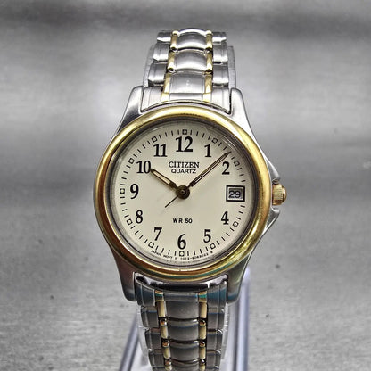 Citizen Watch Women 24mm Ivory Dial Two Tone Date Round 1012-S038375 New Batt LD0
