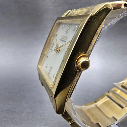 Citizen Eco-Drive Tank Watch Men 27mm White Dial Gold Date E010-S95986 Runs JP2