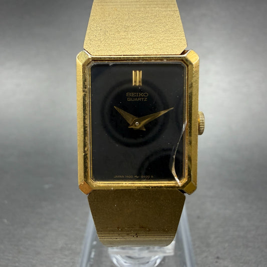 Seiko Watch Women 17mm Black Dial Gold Tone Rectangle 1400-8479 New Battery VTG0