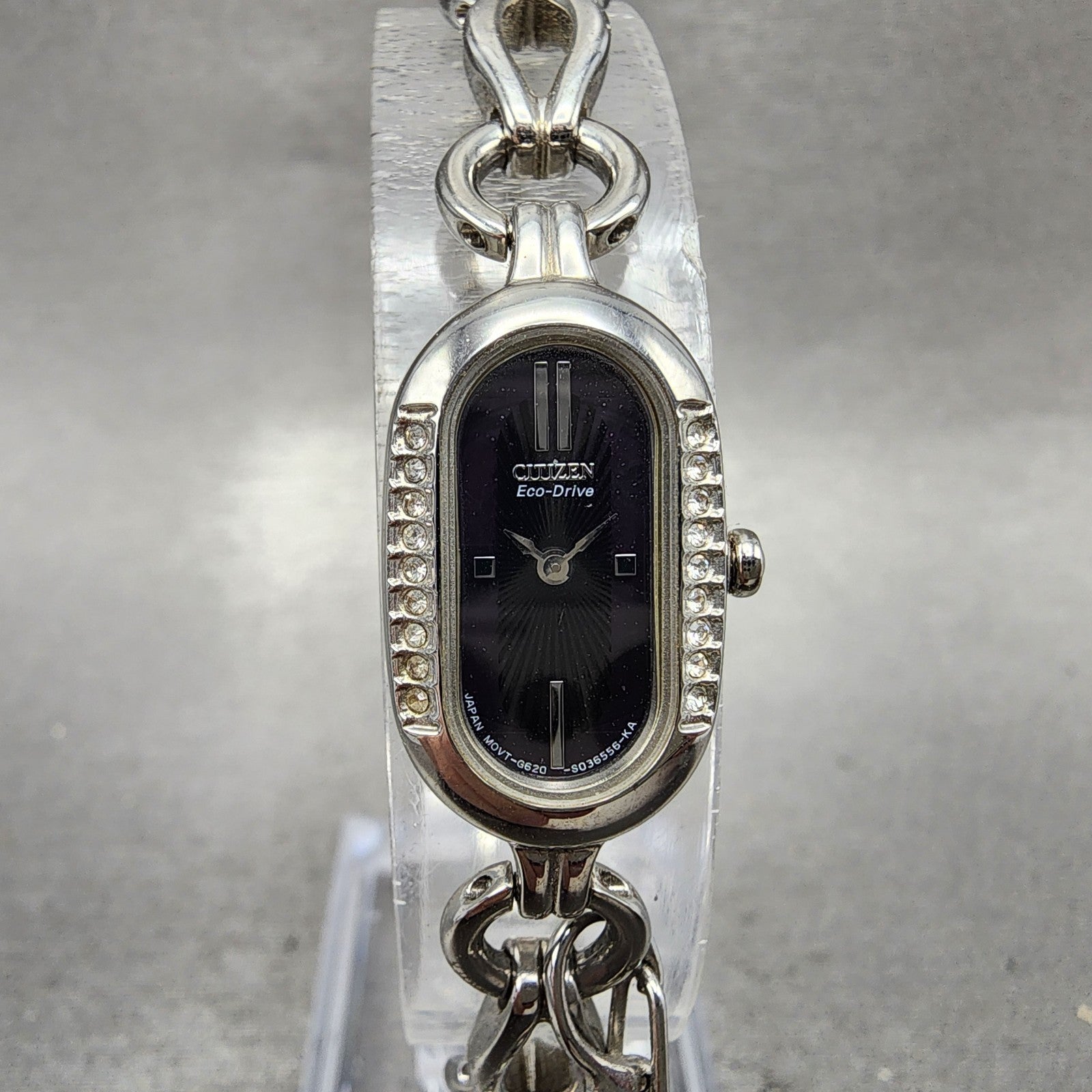 Citizen EcoDrive Watch Women 14mm Black Dial Silver Tone Oval Crystal Bezel0