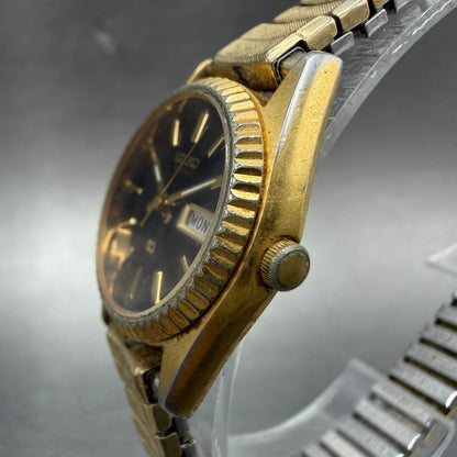Seiko SQ Watch Women 24mm Black Dial Gold Tone Daydate 24mm Round New Battery 562