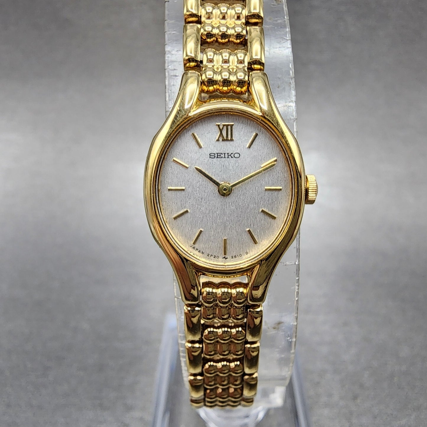 Seiko Watch Women 18mm Silver Dial Gold Tone Oval 2p206230 New Battery0
