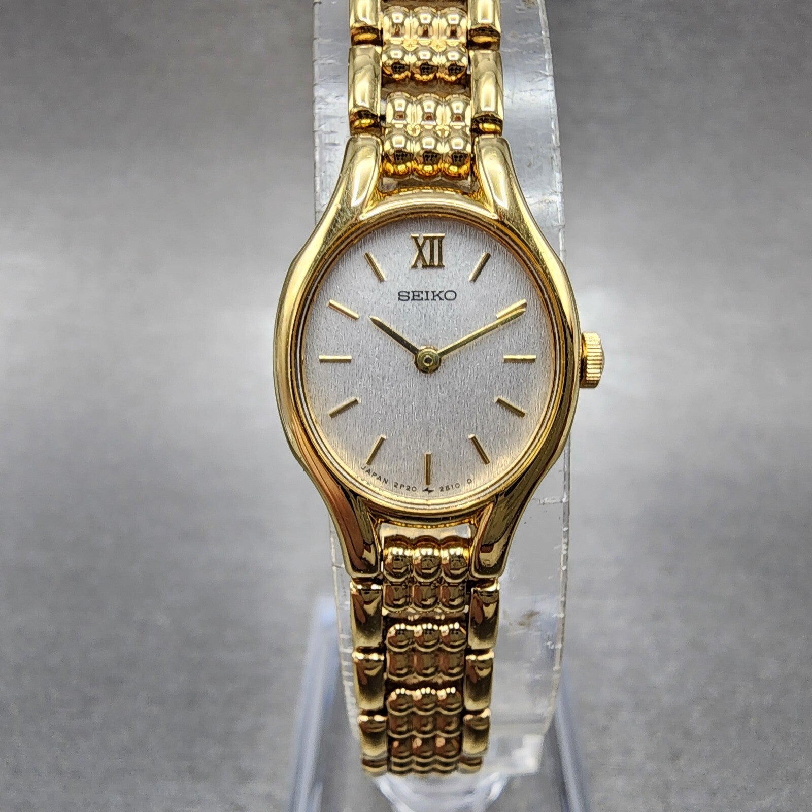 Seiko Watch Women 18mm Silver Dial Gold Tone Oval 2p206230 New Battery0