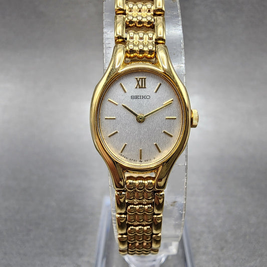 Seiko Watch Women 18mm Silver Dial Gold Tone Oval 2p206230 New Battery0