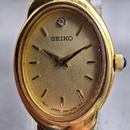 Seiko Watch Women 18mm Champagne Dial Gold Tone Oval 1N00-0BL0 New Battery VTG1