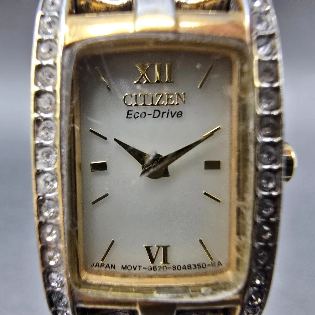 Citizen Eco-Drive Tank Watch Women 15mm White Dial Gold Tone Crystal Bezel Runs1