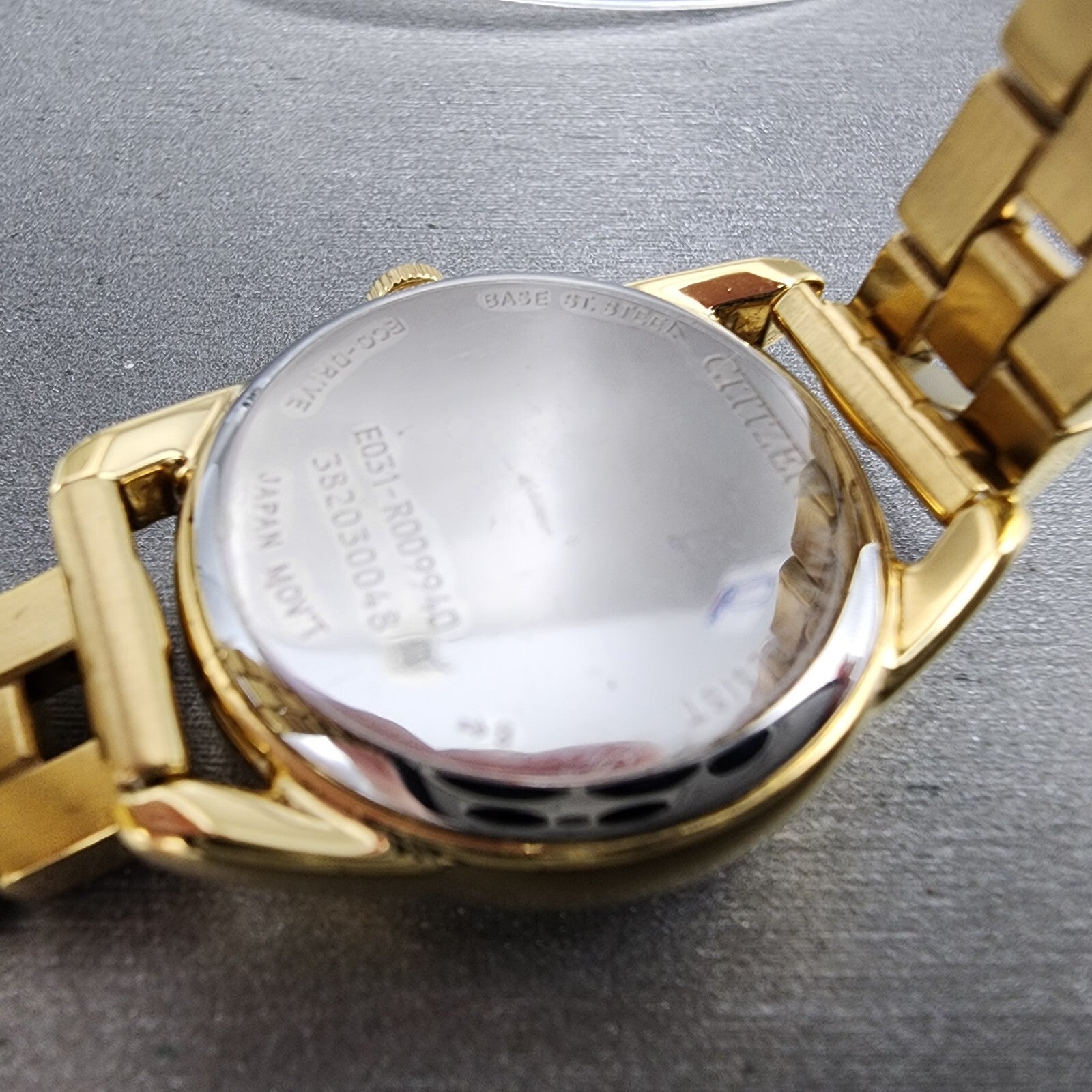 Citizen EcoDrive Watch Women 27mm White Dial Gold Tone Round EM068274A Works9
