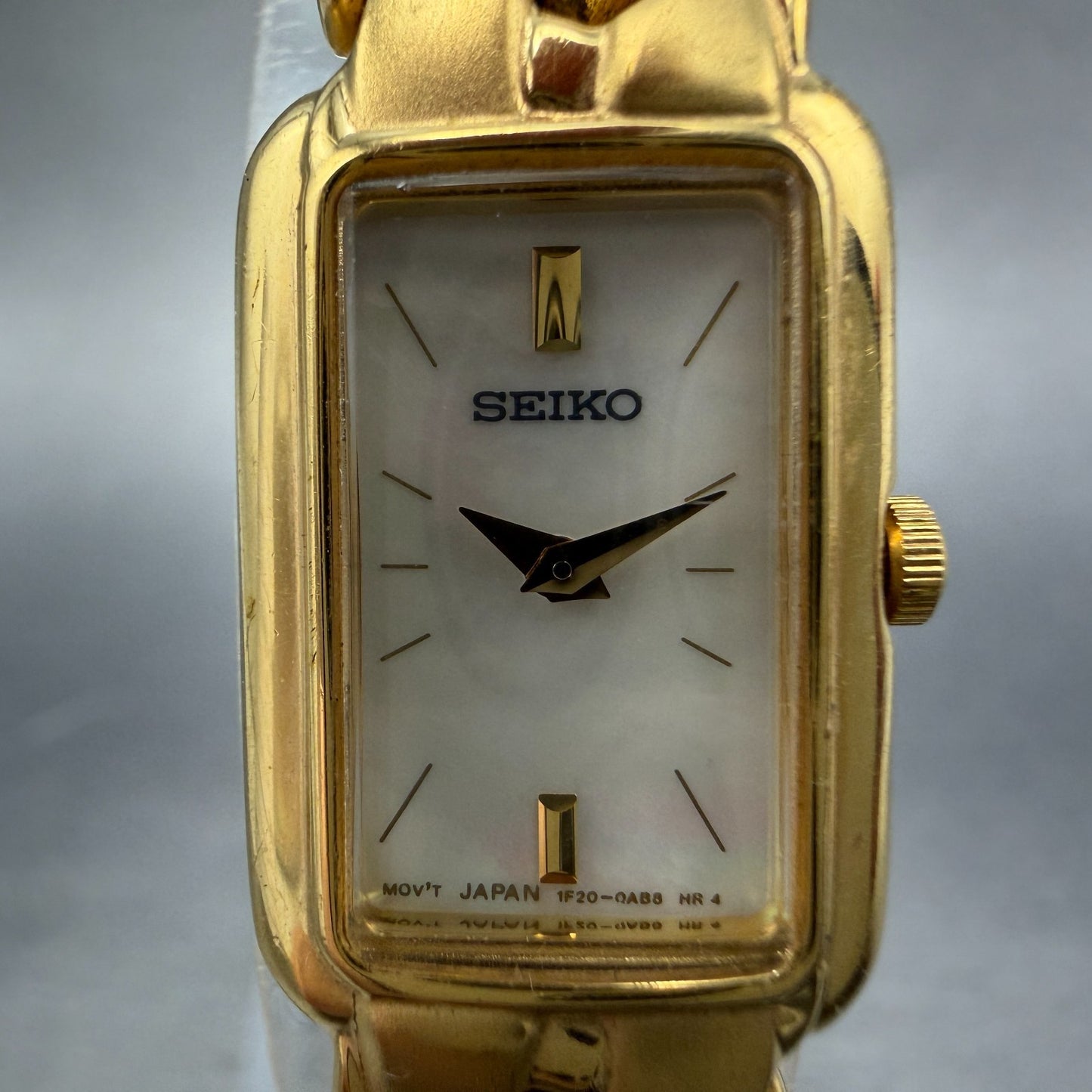 Seiko Tank Watch Women 15mm MOP Dial Gold Tone Rectangle 1F20-0AC0 New Battery1