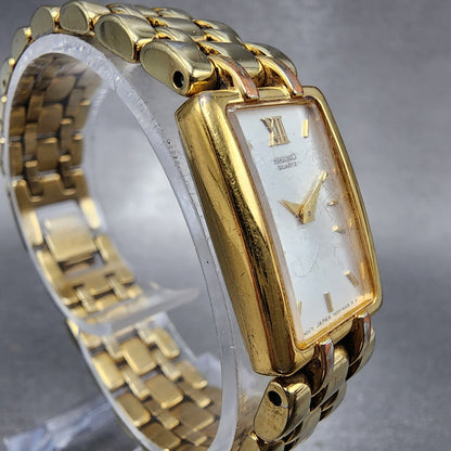 Seiko Tank Watch Women 17mm White Dial Gold Tone Rectangle 1N006B79 New Batt3