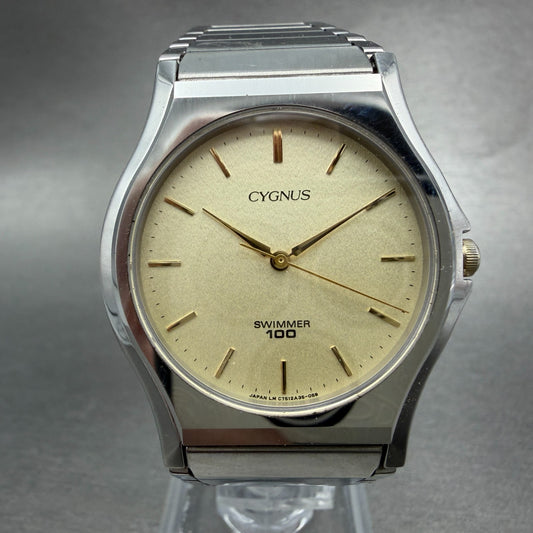 Orient  Cygnus Swimmer Watch Unisex 33mm Champagne Dial Silver Tone New Battery0
