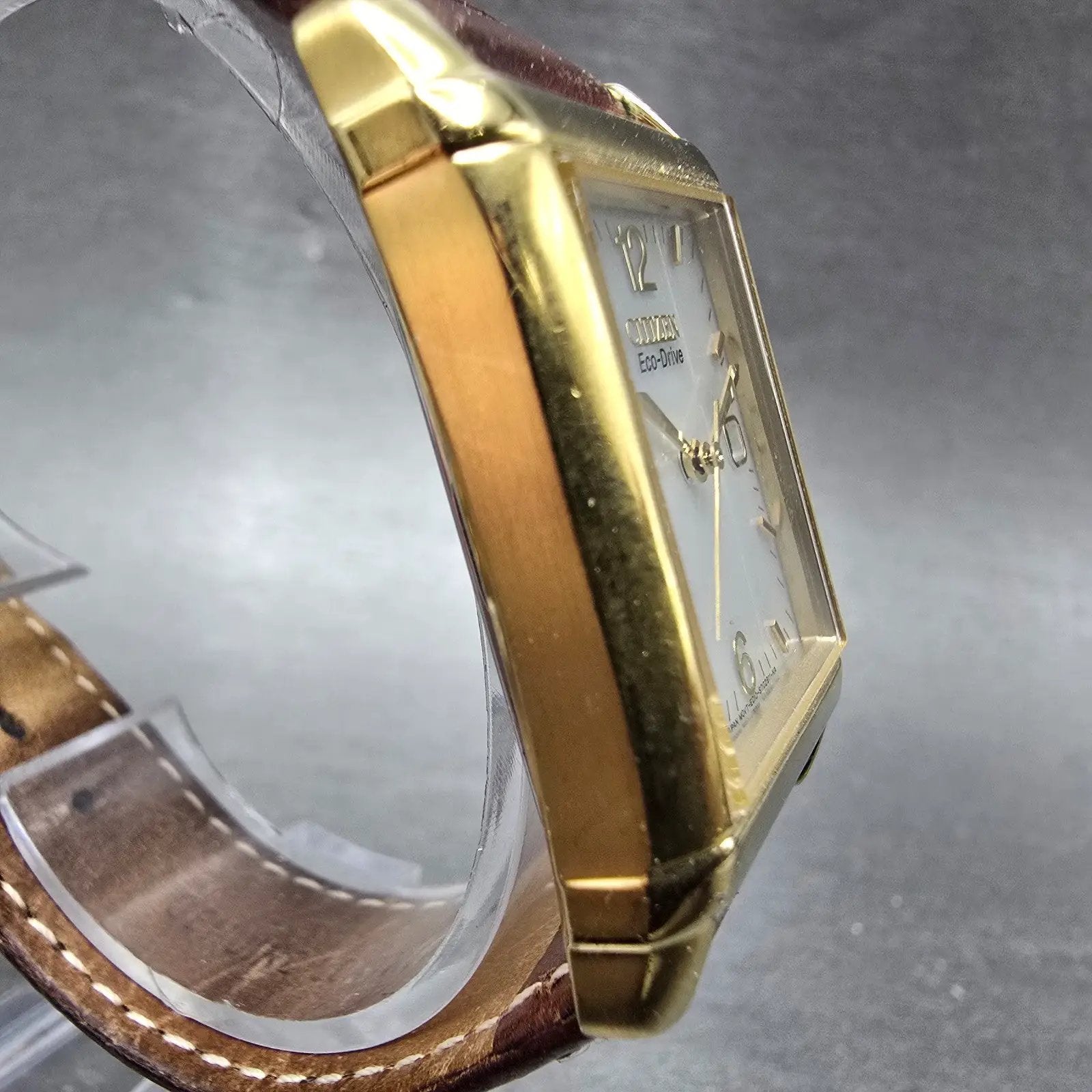 Citizen Eco-Drive Tank Watch Men 25mm White Dial Gold Date E010-S001579 Works HG3
