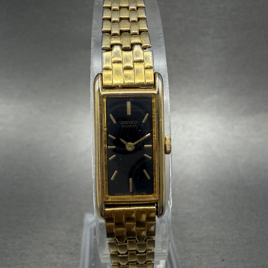 Seiko Tank Watch Women 12mm Black Dial Gold Tone Rectangle 2E20-6429 New Battery0