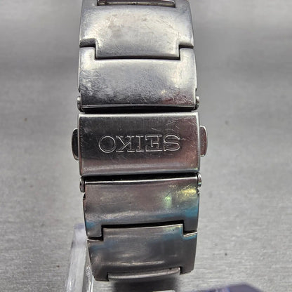 Seiko Watch Men 32mm Silver Dial Silver Tone Date Rectangle 7N32-0AL0 New Batt D7